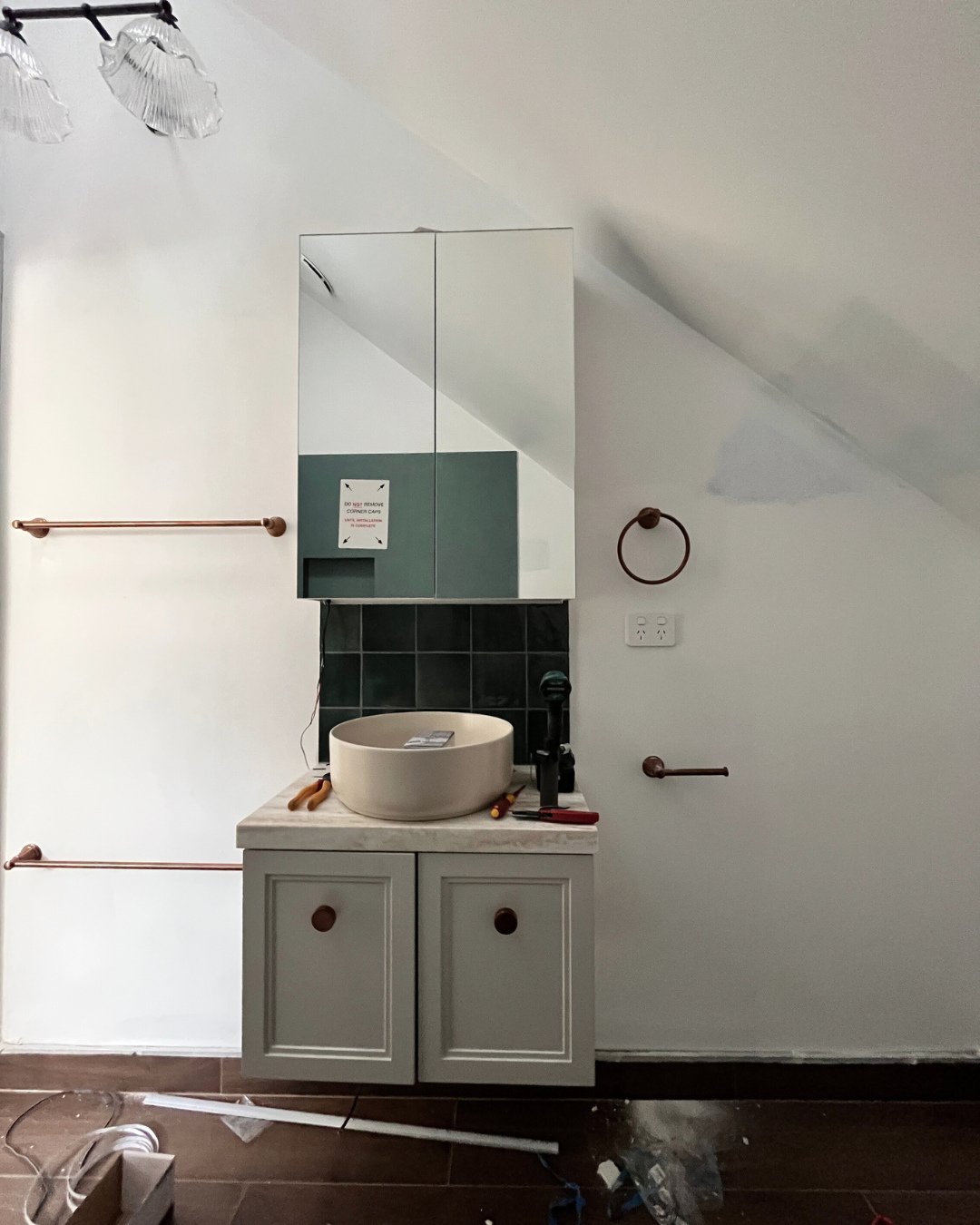 Abbotsford project: Before➡️During➡️After ⁠
⁠
A once tired studio apartment bathroom, now reimagined into a space full of personality. Rich walnut timber-look tiles, bold teal features and heritage-style copper tapware bring warmth, depth and charact