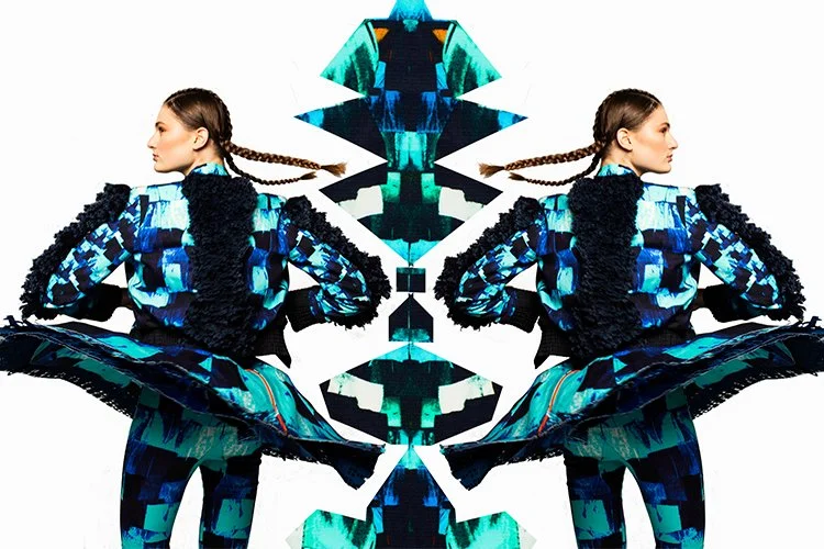 Symmetrically edited photo of a woman with braided hair in a blue and black geometric outfit, posed with her back to the camera, against a plain white background.