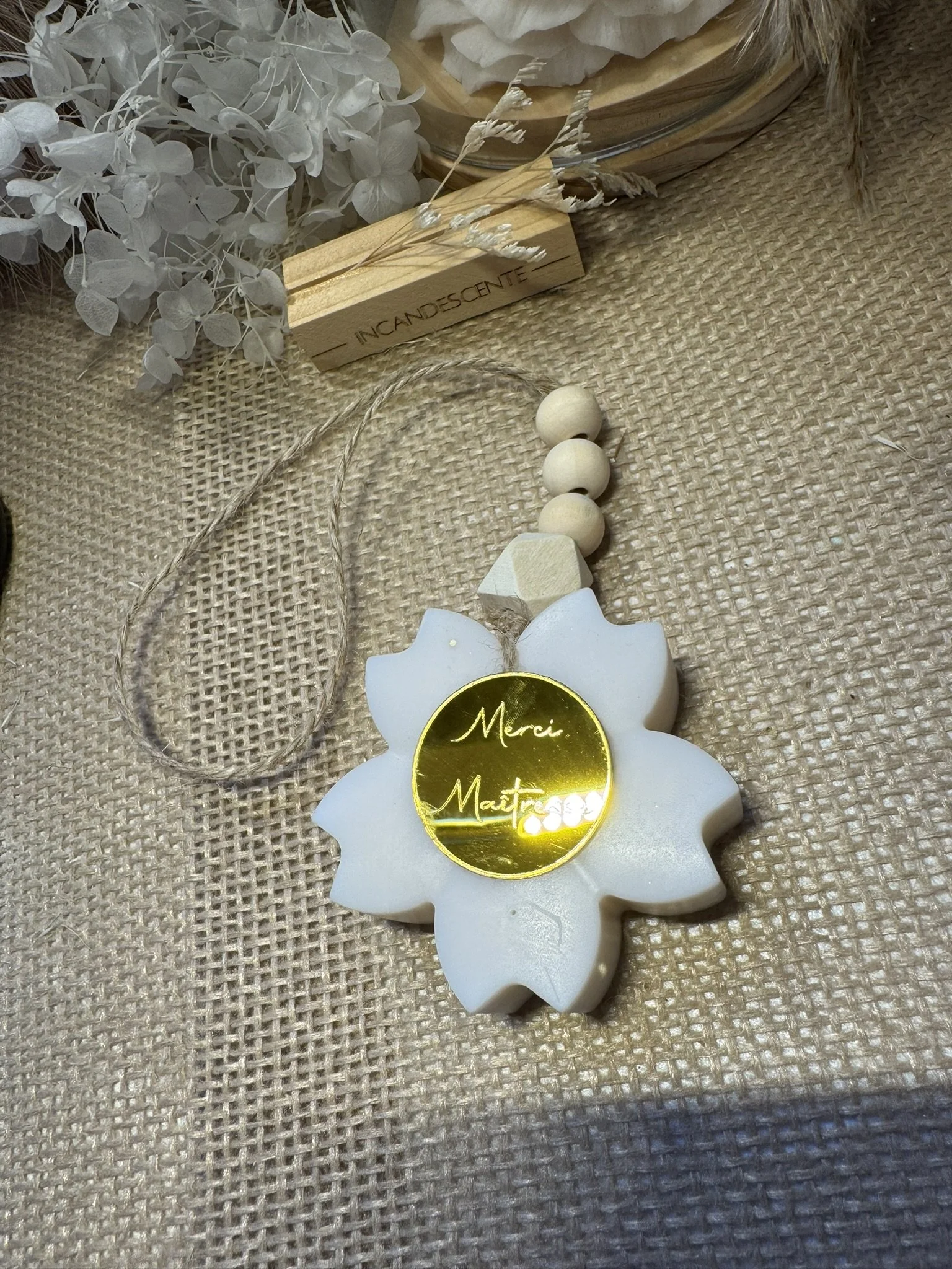 Suspension médaillon fleur