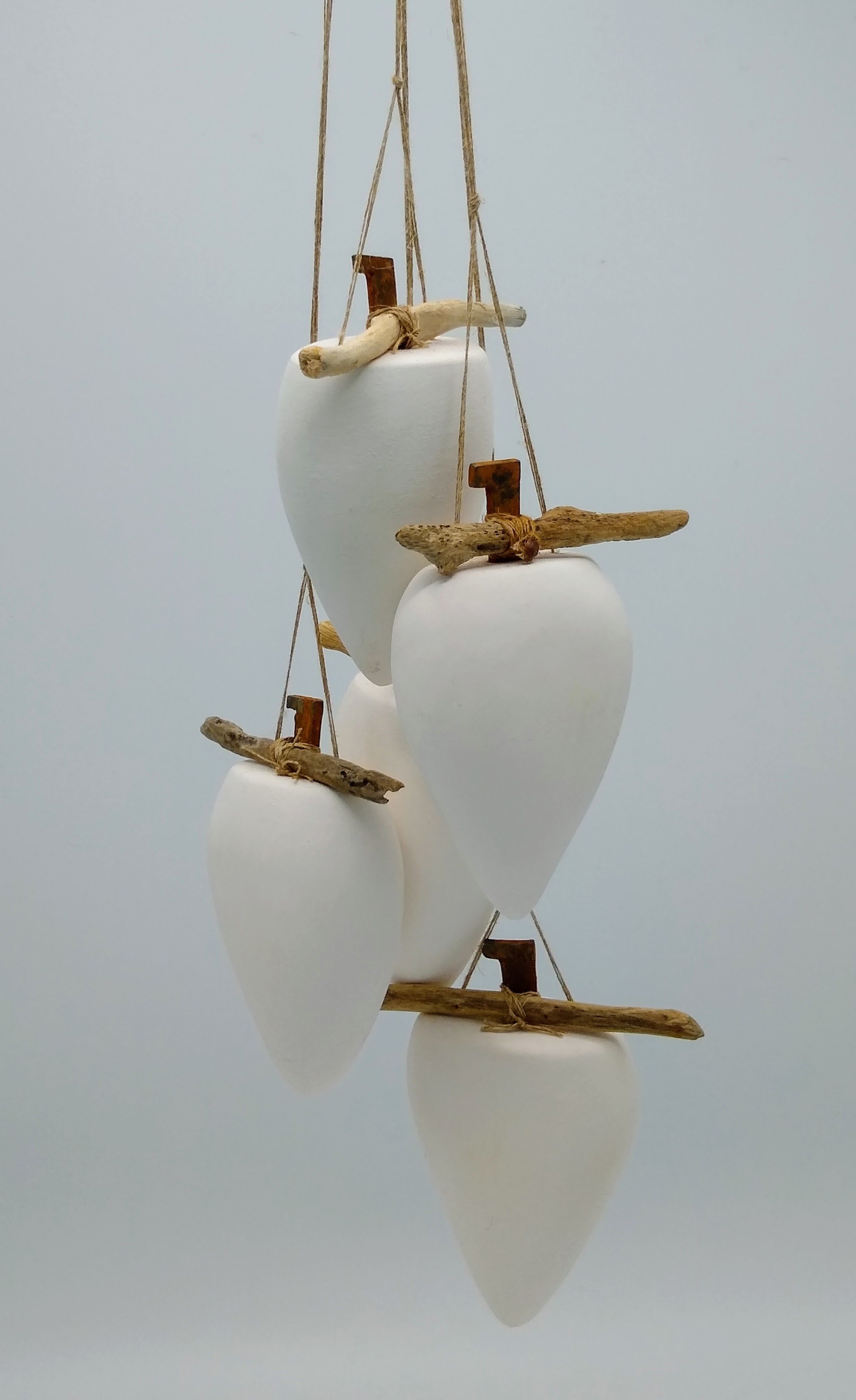 Bottles with drift wood and nails.jpg