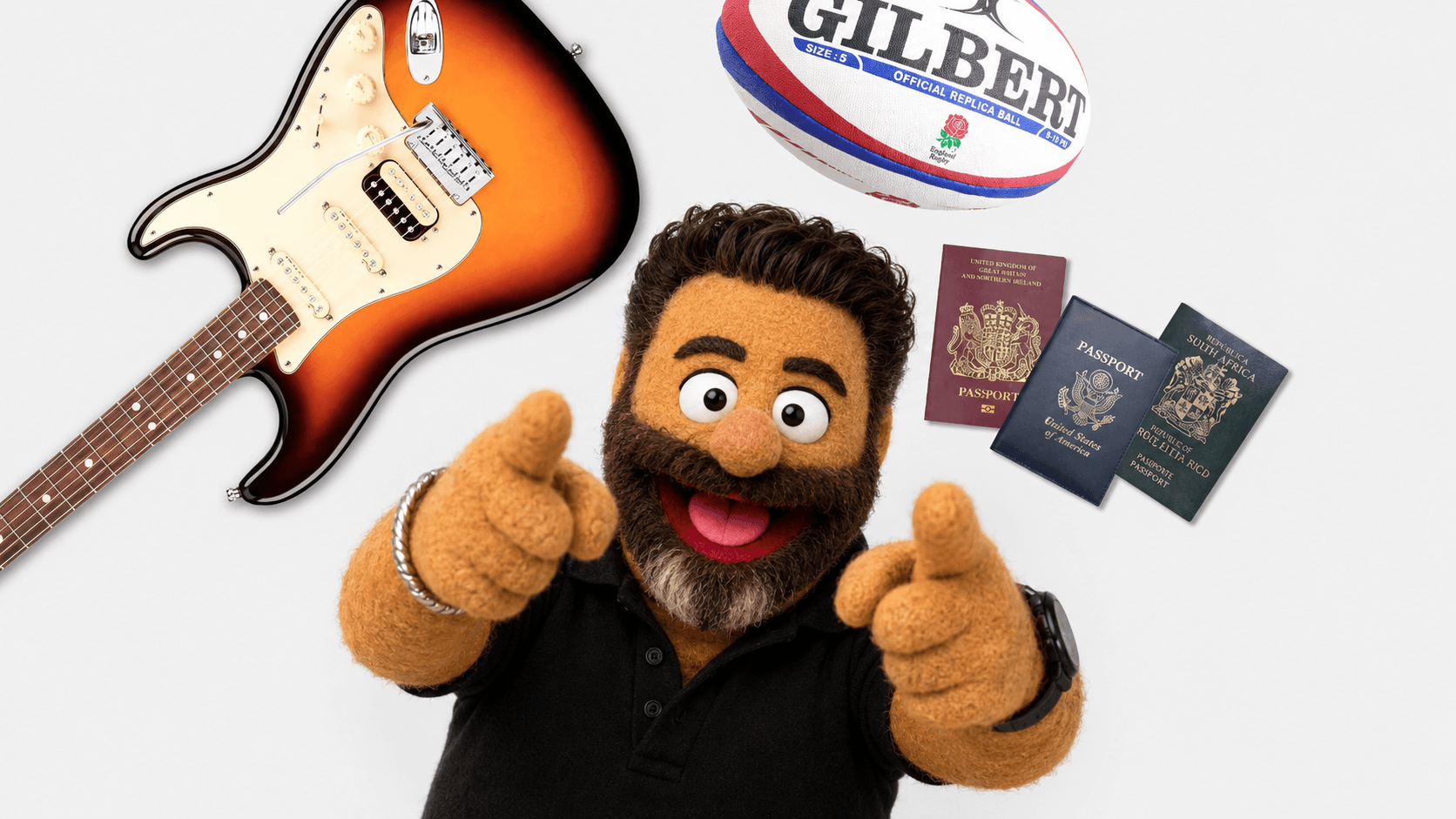 A person in a large Bob Ross style puppet mask with a beard, smiling, outdoors with the Hollywood sign in the background.