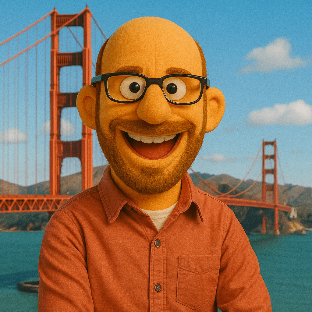 A cheerful animated character with glasses, a beard, and a bald head, standing in front of the Golden Gate Bridge in San Francisco.