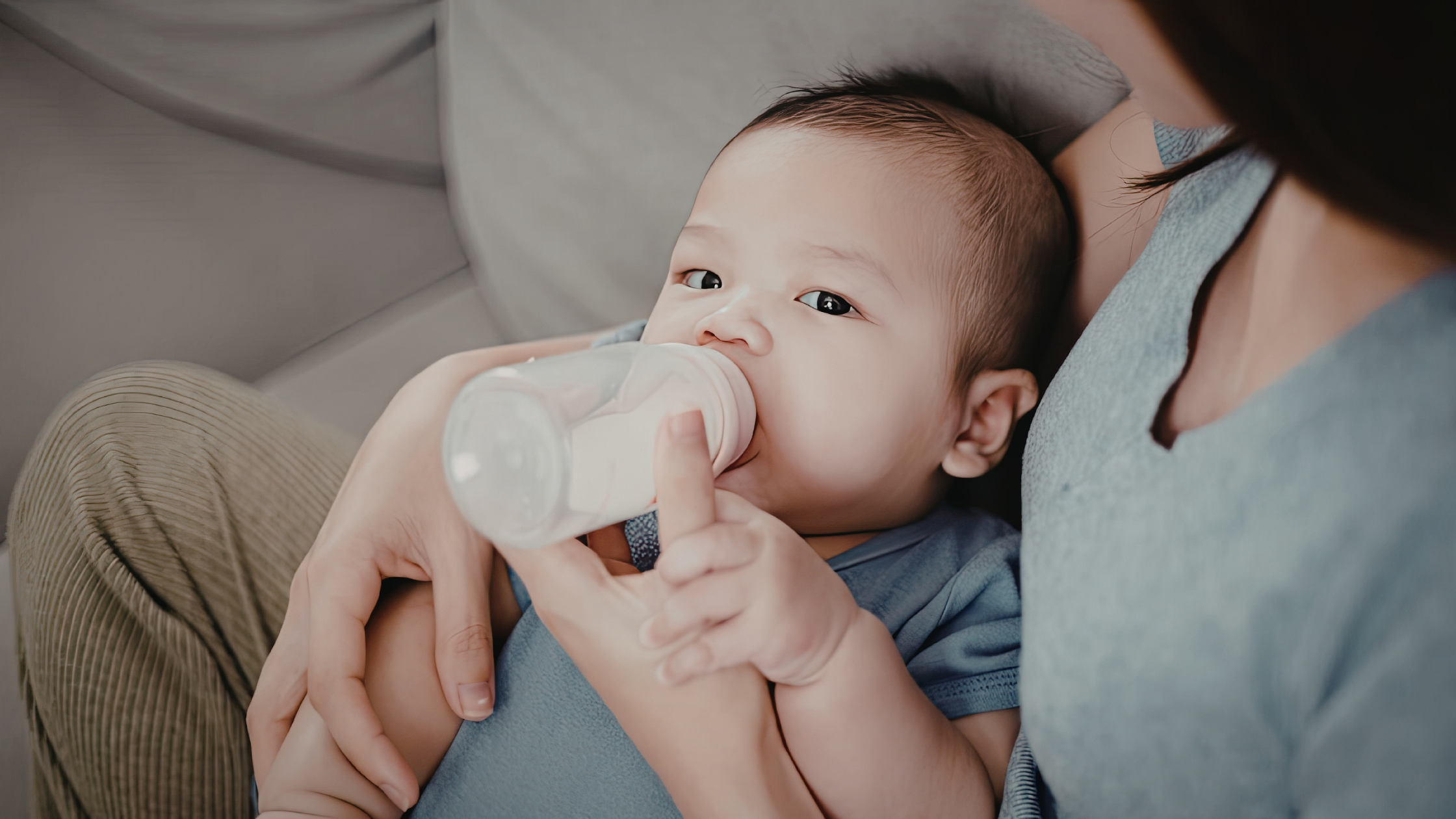 baby clicking while bottle feeding