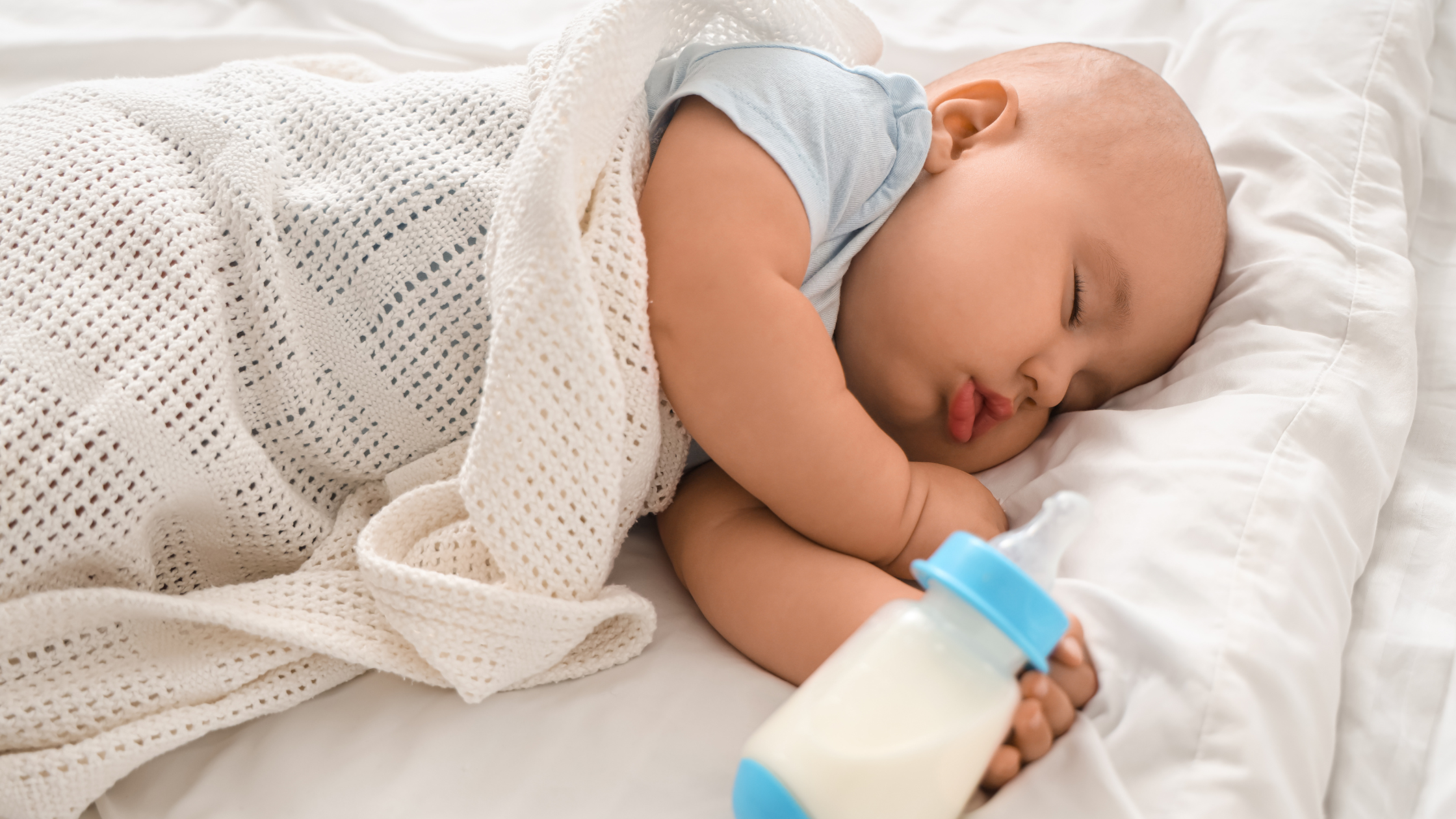 baby falls asleep while bottle feeding