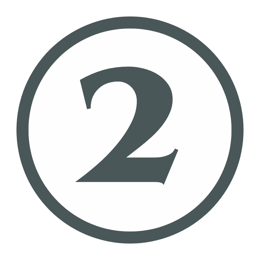 A black and white number two inside a circle, resembling a speed limit or signage marker.