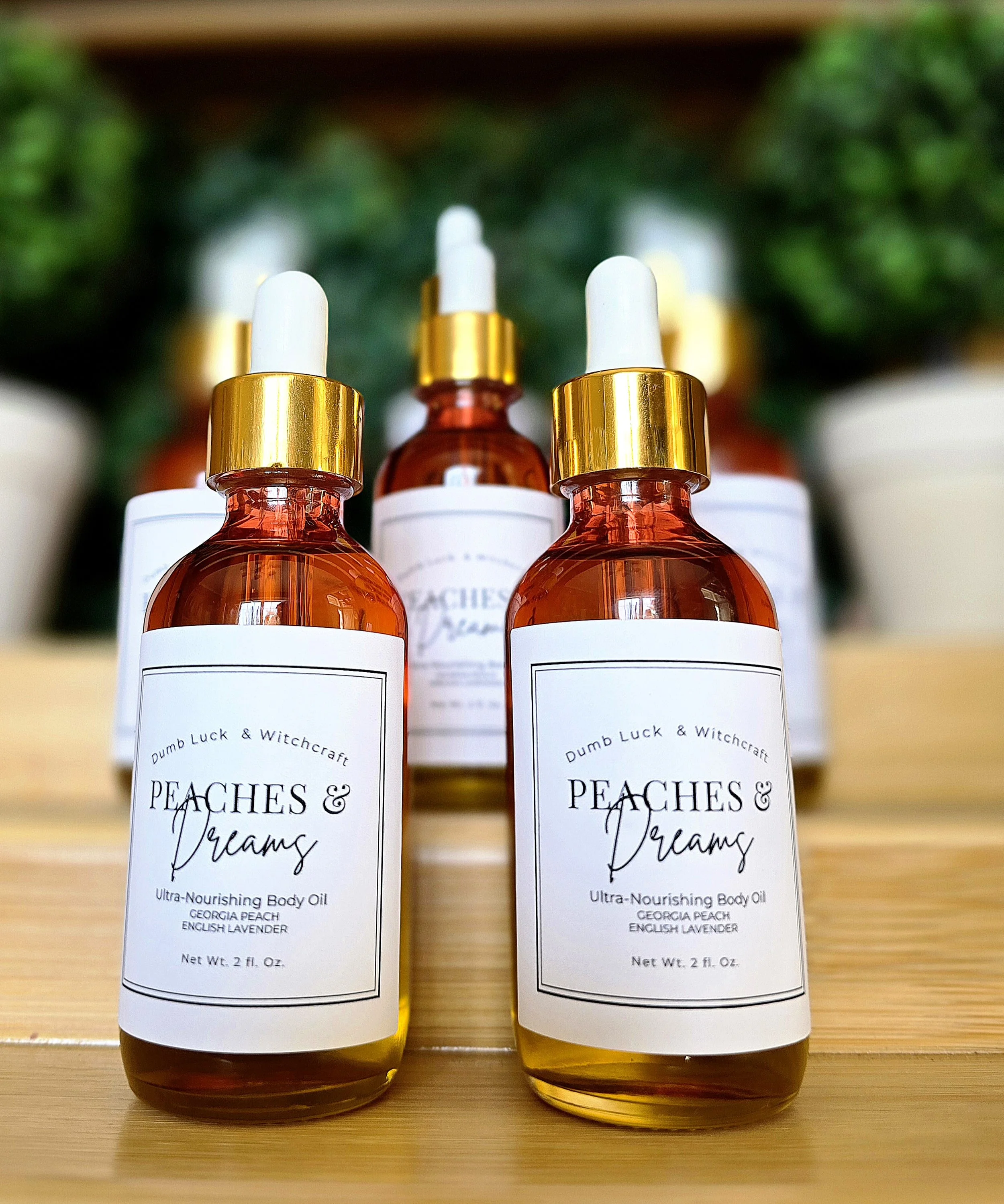 fuscia to gold ombre bottle with dropper