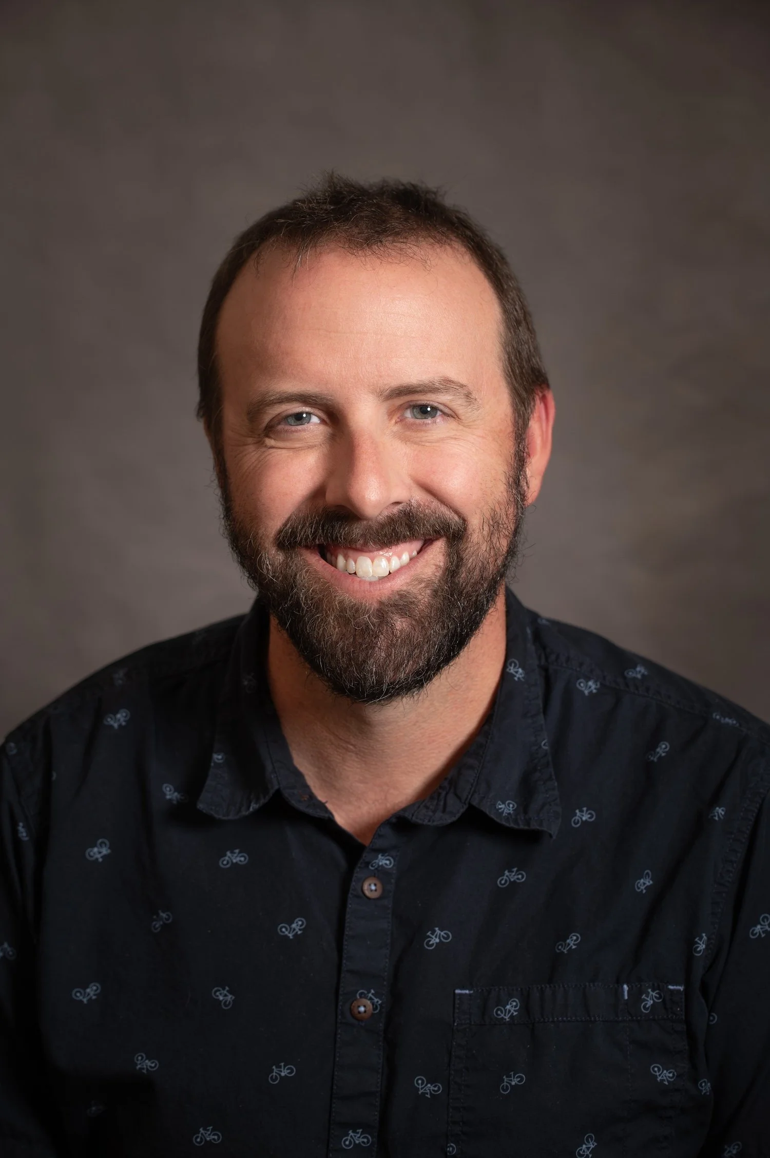 Glacier Medical Associates logo with silhouettes of people and mountains, text "Photo Coming Soon!"