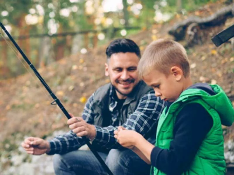 Father and son fishing, how trauma can affect the body