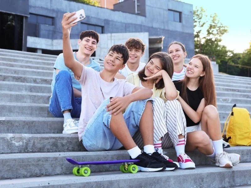Group of teens after school talking about school anxiety in California
