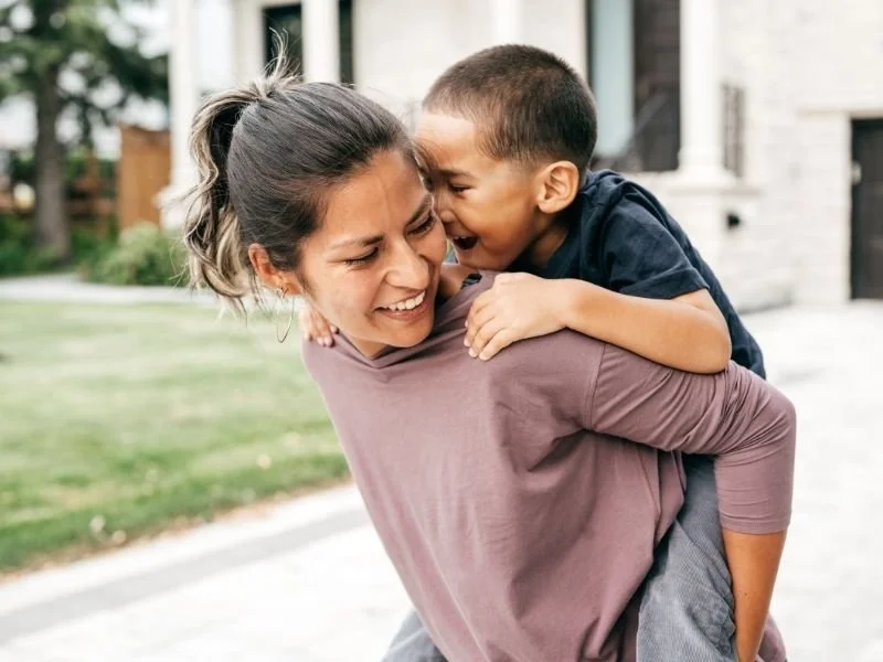 Mom and son leaving therapy session with Community Behavioral Health