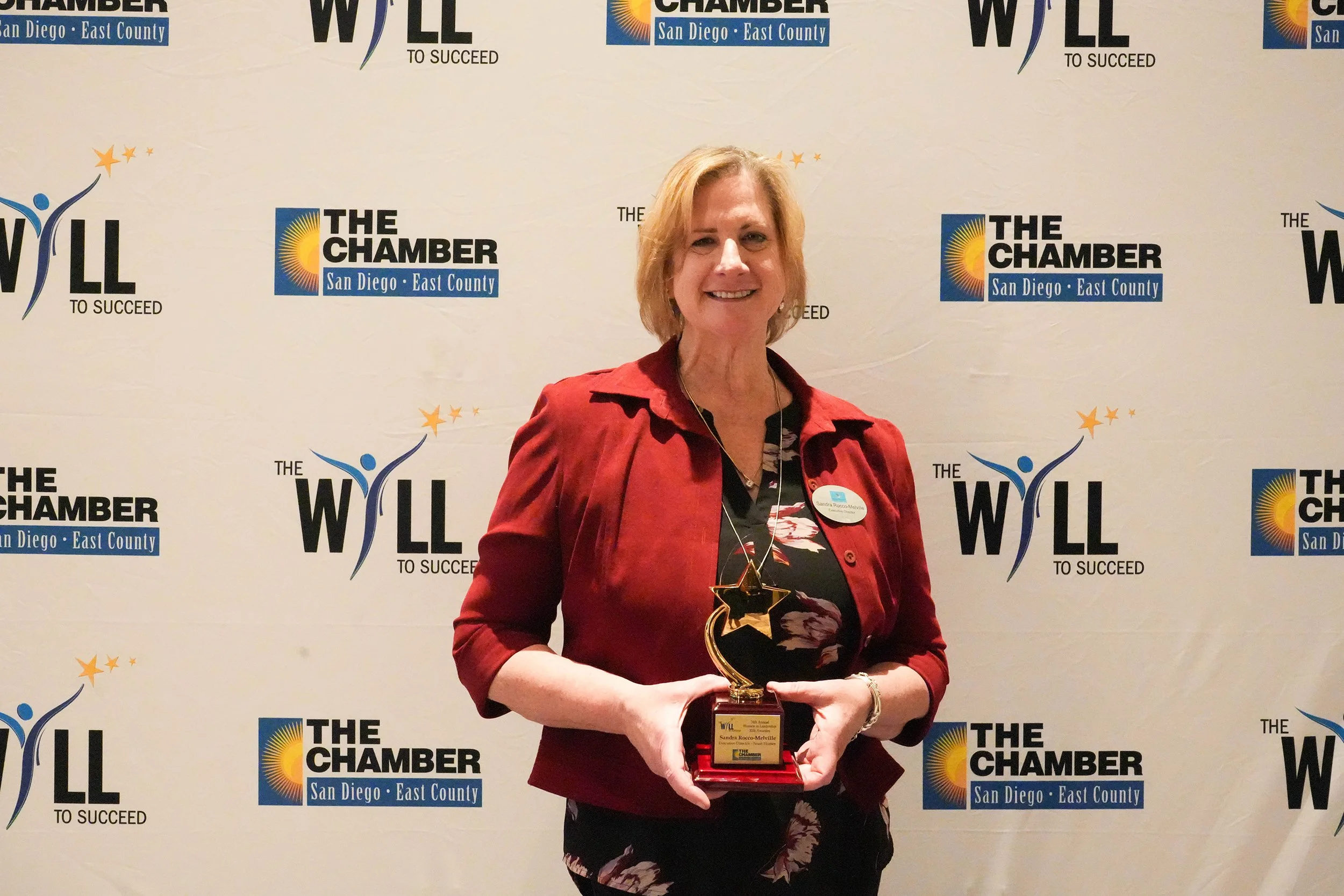  Sandra Rocco-Melville, Executive Director of Noah Homes wins Women in Leadership award. 