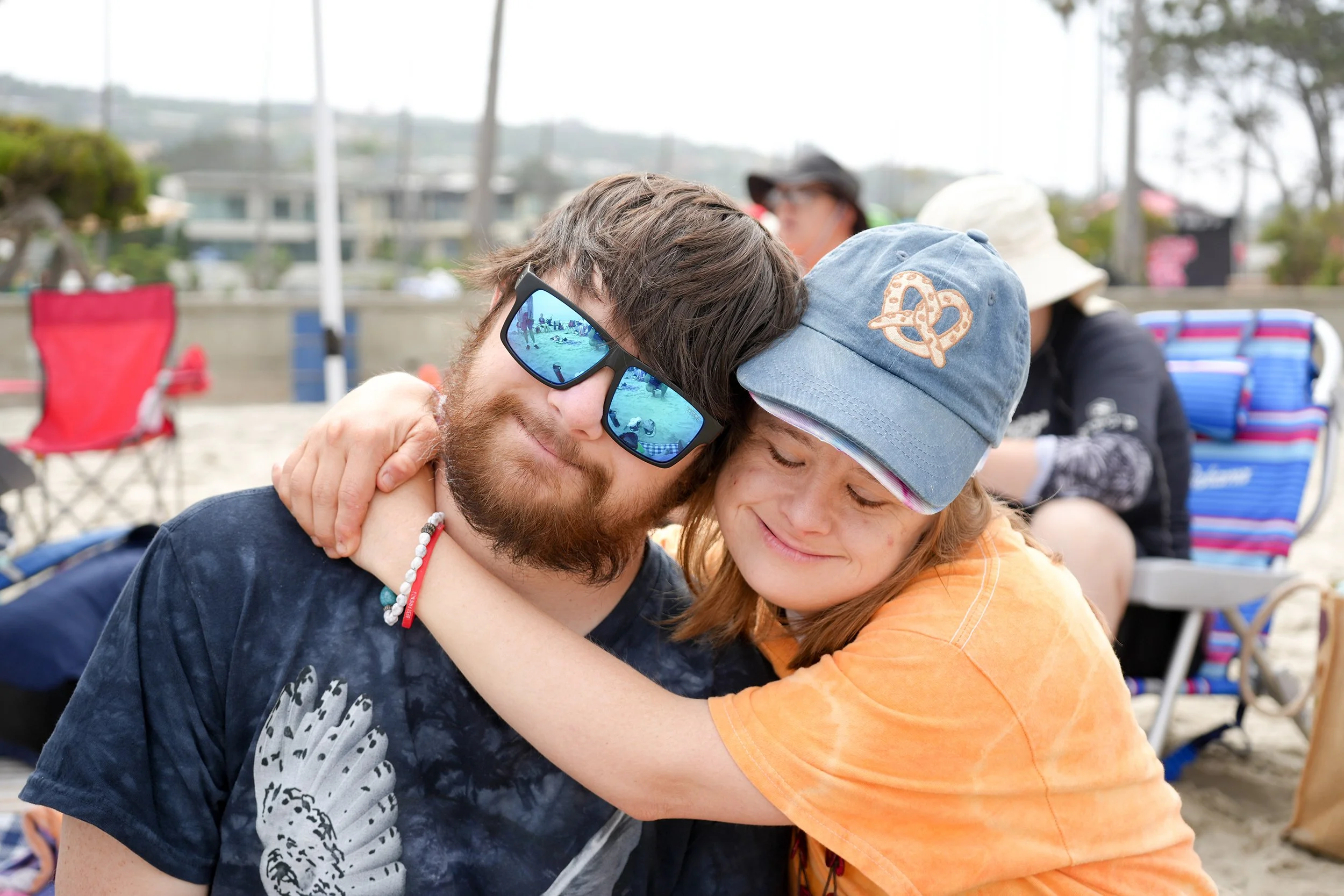 Man and woman hugging at the beach