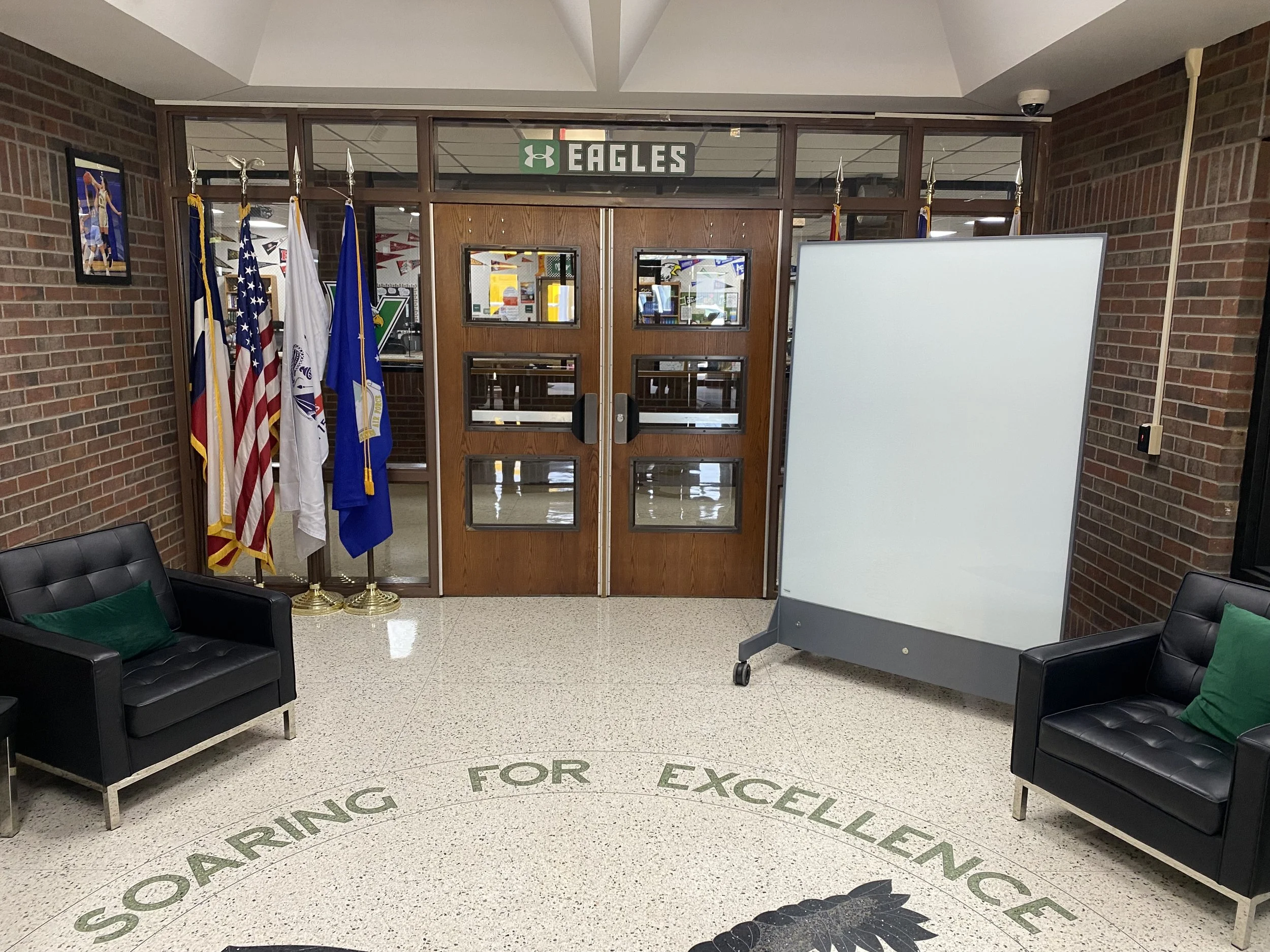 TAG Mobile bulletproof mobile whiteboard at school entrance providing ballistic protection and controlled access