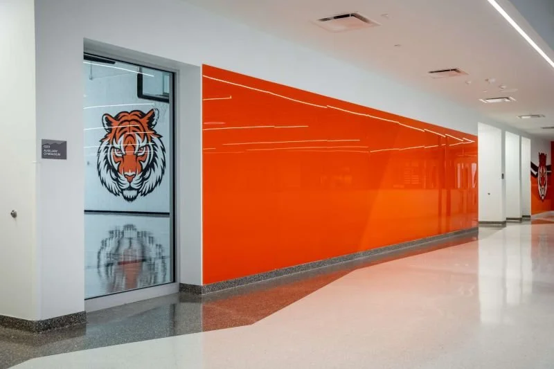 Titan WallShield bullet-resistant wall panels integrated into a modern school hallway providing dry-erase functionality and ballistic protection