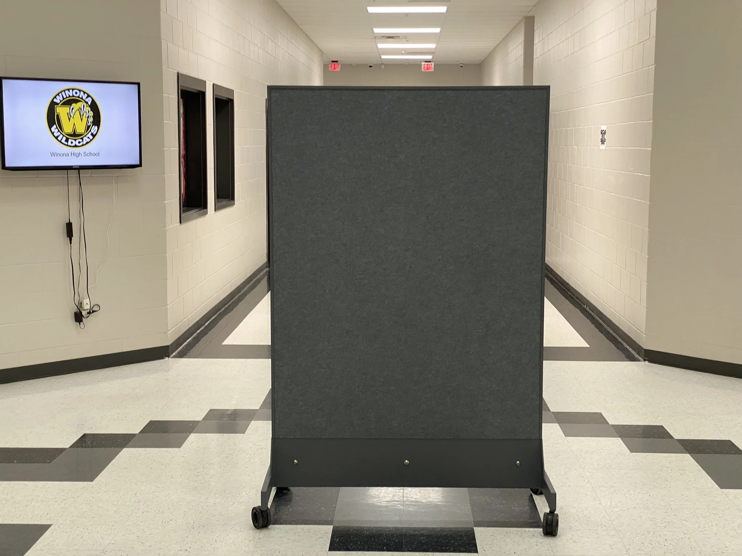 TAG Mobile bulletproof mobile whiteboard in school hallway demonstrating ballistic protection funded through school safety grants