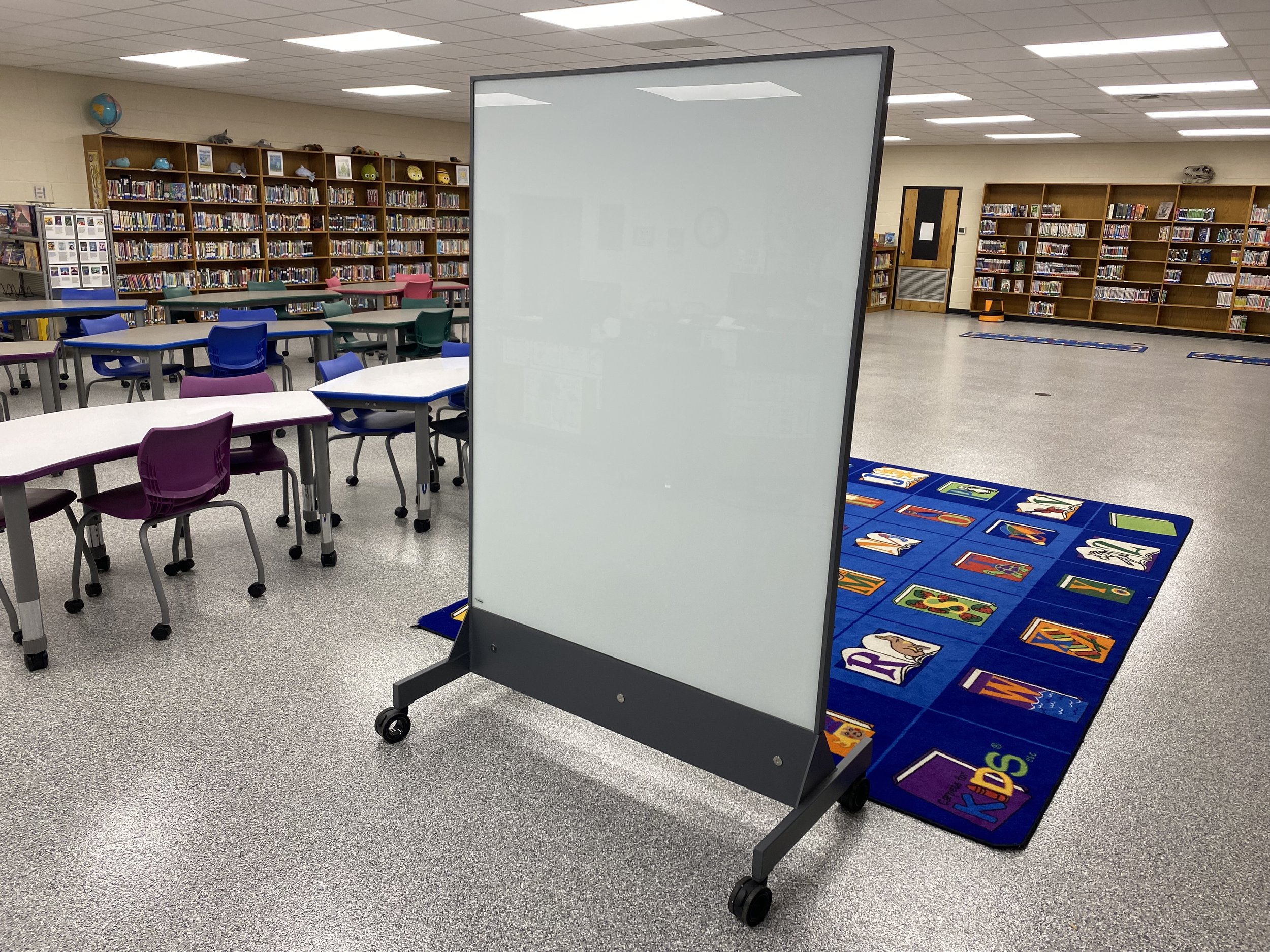 TAG Mobile bulletproof mobile whiteboard in school library providing ballistic protection in large open classroom environment
