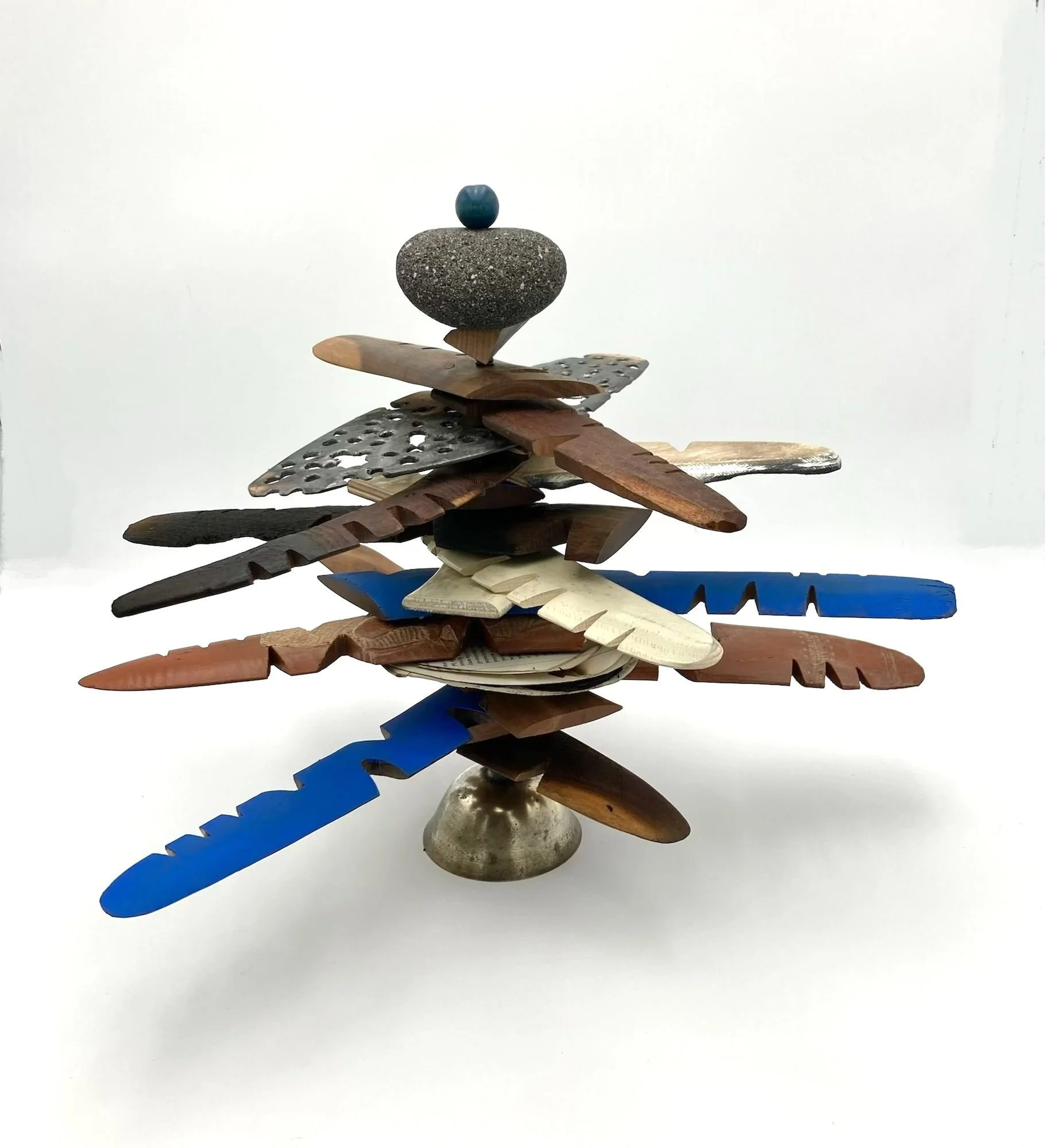 Tannenbaum au Boomerangs- 18x18x18 -boomerangs, lava rock and found objects on metal armiture.