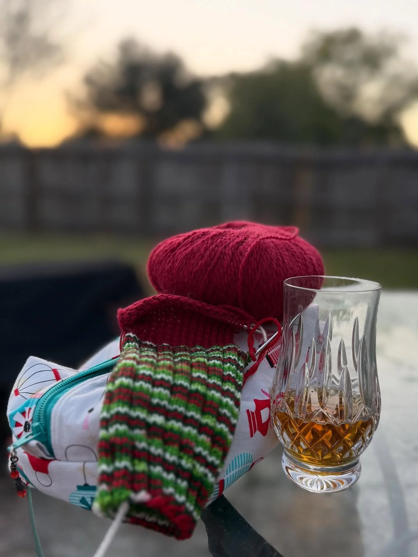This evening I am sipping my bourbon and knitting a Christmas sock. The beautiful yarn, rescued from my stash, was dyed by the fabulous Lindsay, @_thefiberseed