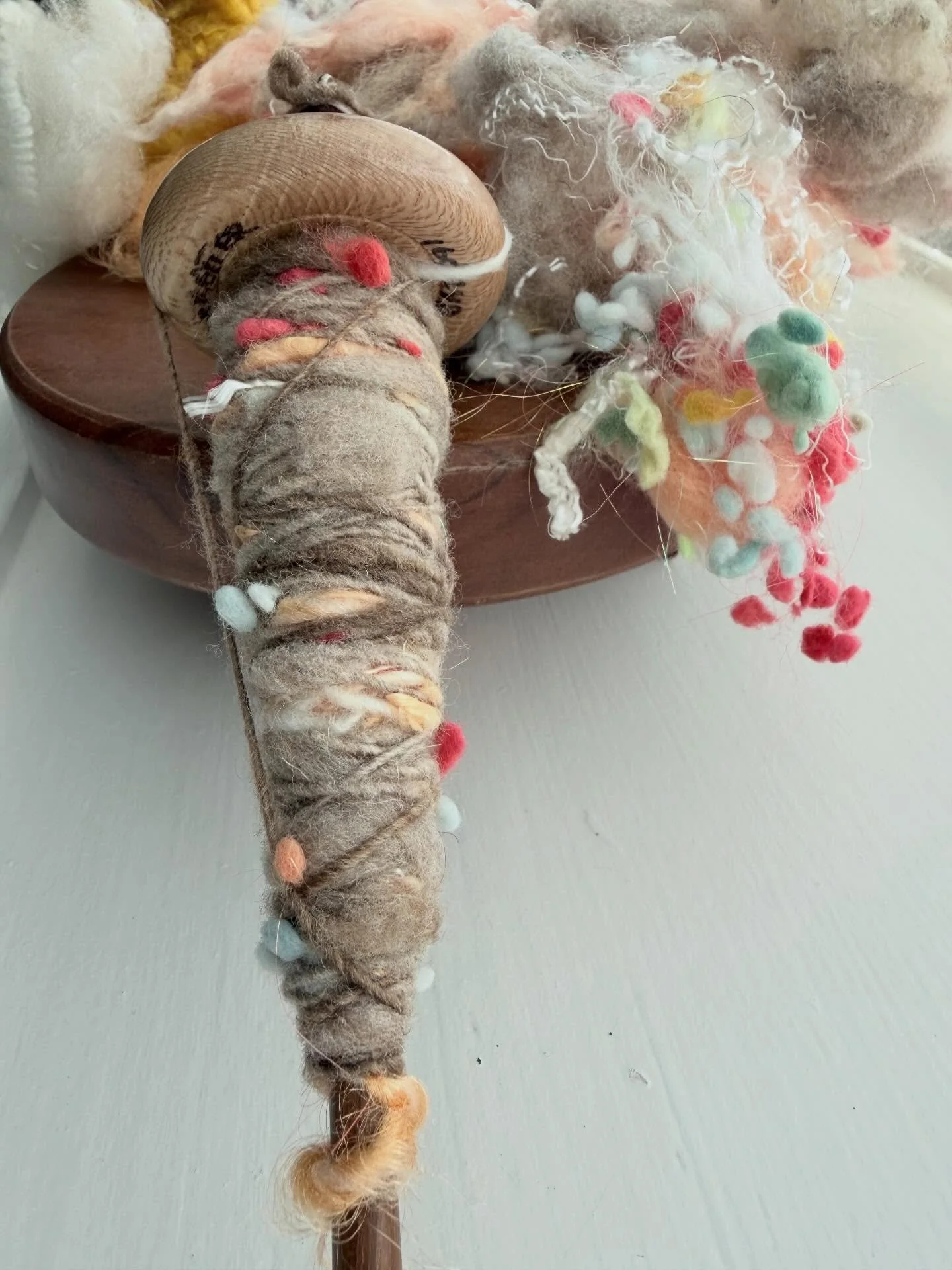 Spinning fluff right out of the bag is so much fun!  Thanks to the artistry of @neauveau I get to play with wool and pretty, fluffy things to make yarn!