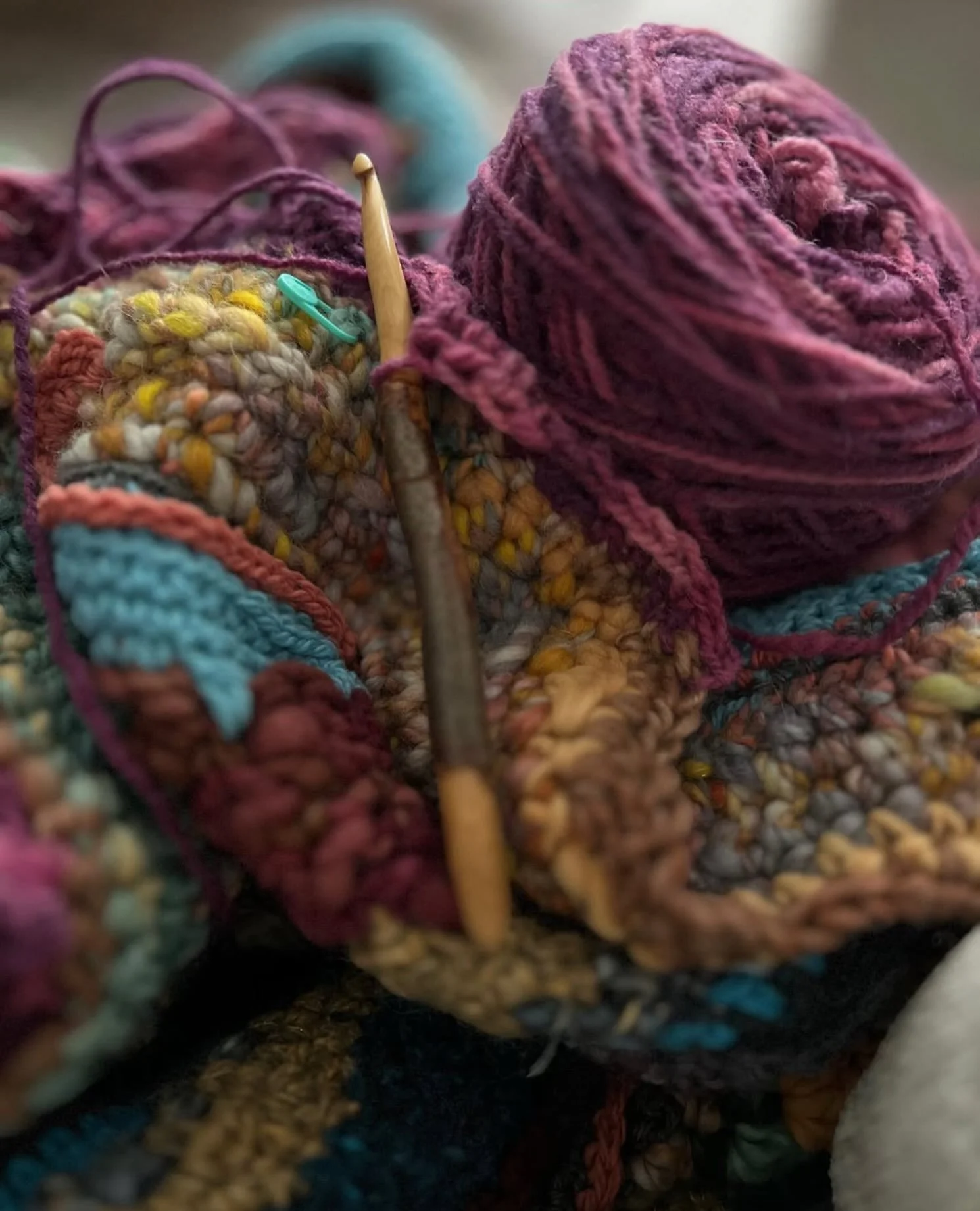 Nothing new to show, so I dipped into the archives and found this memory. Hand spun yarn plus a few commercial yarns crocheted into a giant freeform blanket. I just love these colors and textures&hellip;and of course my favorite hook by @handcarvedho