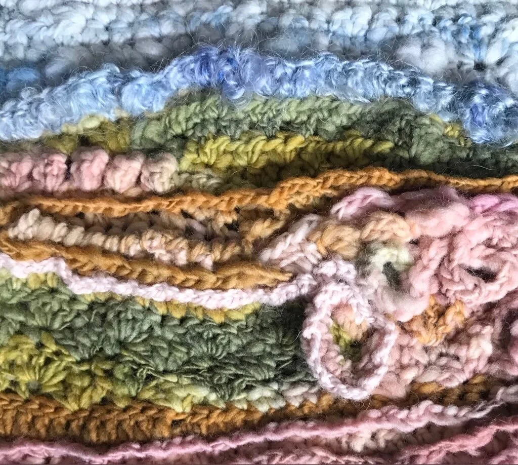 This is one of my favorite crochet pieces. Hand spun yarn and creative use of crochet stitches produce gorgeous texture.