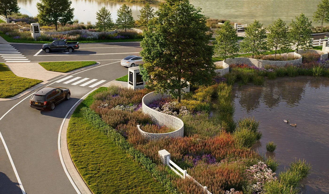 Aerial rendering of The Granary entry showing curving brick garden walls, native plantings, a small pond, and vehicles moving through the roundabout.