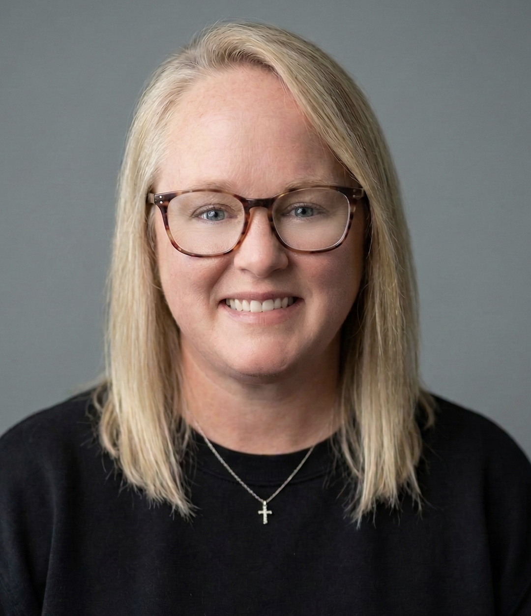 Professional headshot of Becky Olson, a licensed therapist and EMDR certified counselor in Iowa.