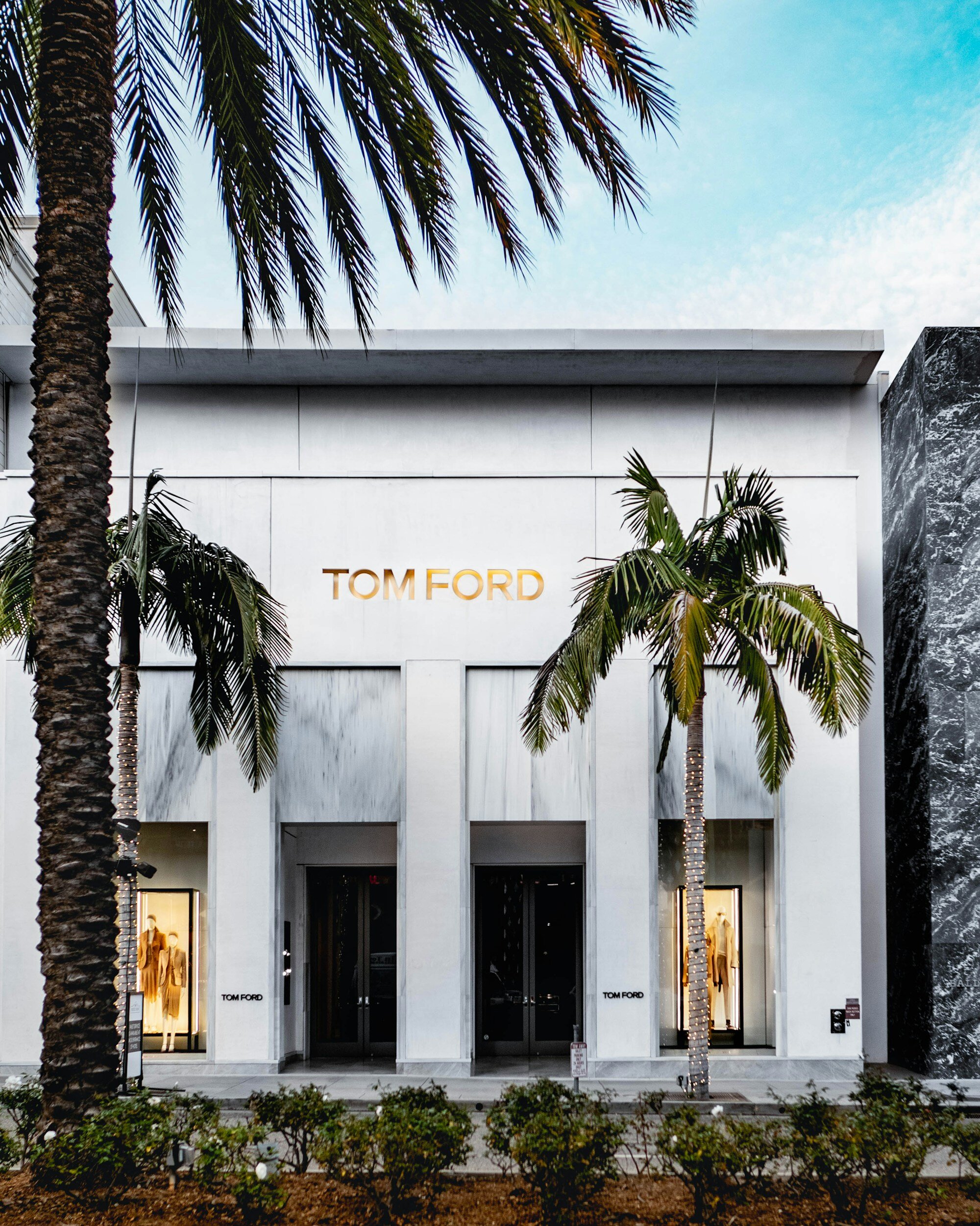 Tom Ford store facade with palm trees