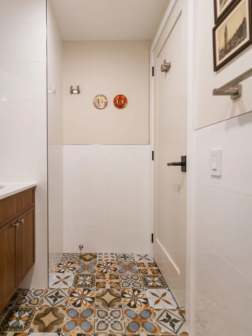 Statement flooring done right.
Every tile brings its own story &mdash; together, they turn this bathroom into a true design moment. From the warm earth tones to the unexpected pops of blue, the mix of patterns adds depth, personality, and just the ri