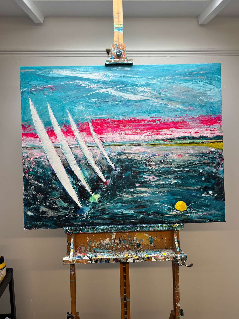 Abstract painting of a seascape with a blue sky, a pink horizon, and a dark water body, featuring four white sailboats with colorful hulls and a yellow sun near the water.