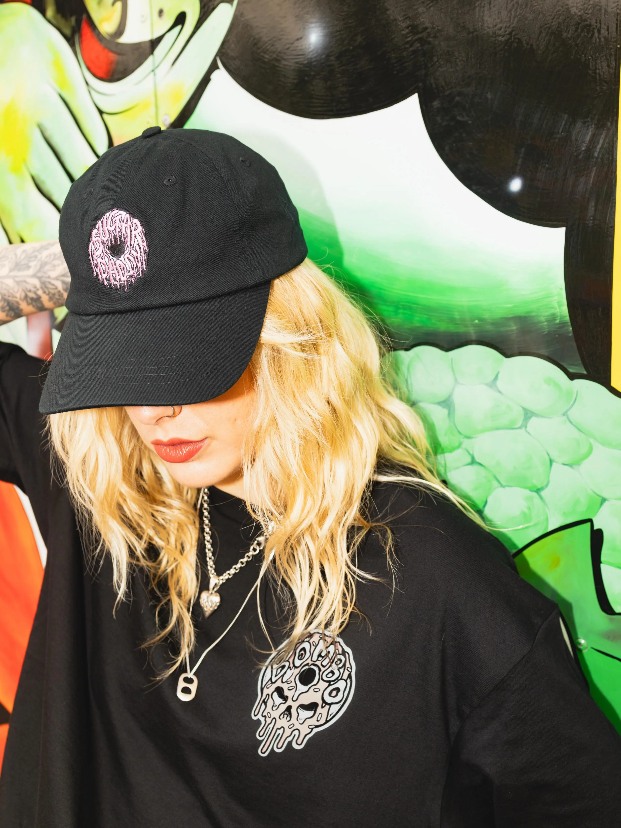 Want to finally get your hands on the new @bombodoughnuts x @baileydraws_vip merch range? Of course you fucking do.

Doughnut Skull Black Tee &pound;25
Sugar Daddy Black Cap &pound;20
Glaze Me Tote Bag &pound;10
Sticker Pack &pound;5

All items are a