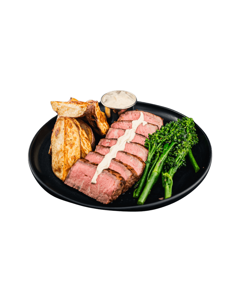 Grilled steak meal prepared by Coalition Kitchen