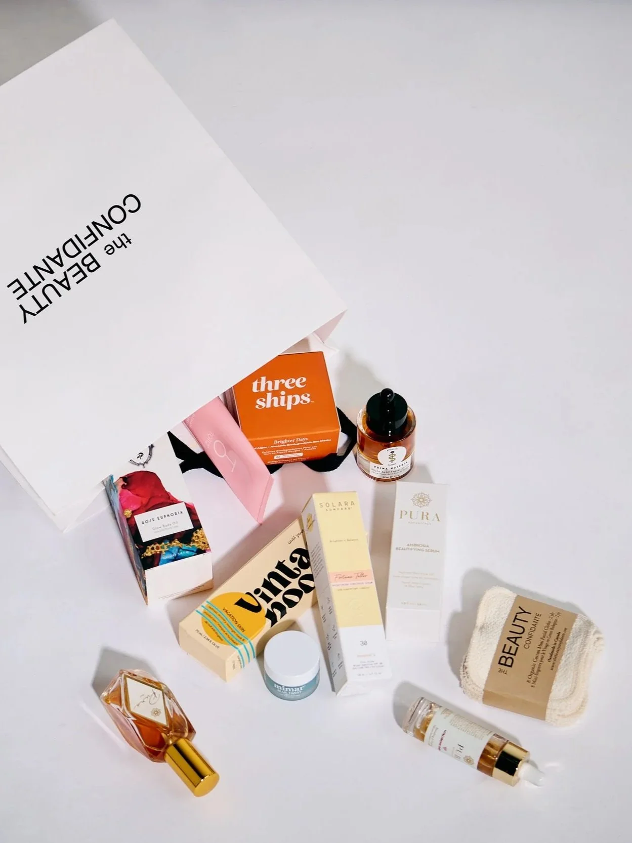 Gift bag spilling with good clean beauty products