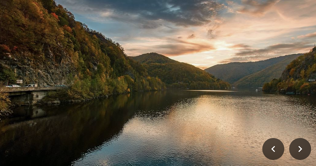A lake surrounded by mountains in the Transylvanian countryside
