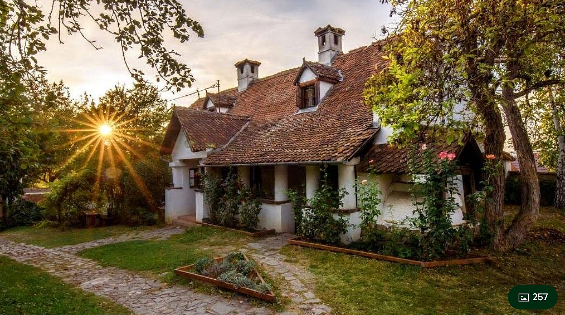 Count Kalnoky's restored guesthouse cottage at sunset, Transylvania