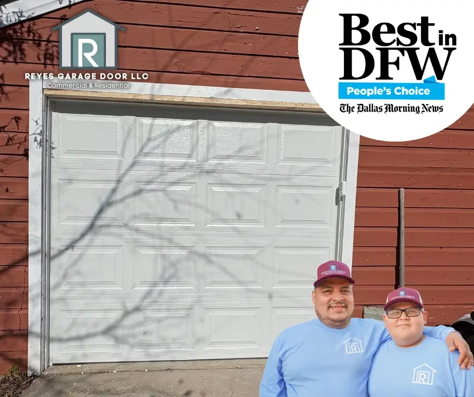 Two men wearing light blue shirts and purple caps with Reyes Garage Door LLC logo, standing in front of a closed white garage door against a red wooden wall, outdoors.