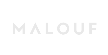 Malouf logo in white text on a black background.