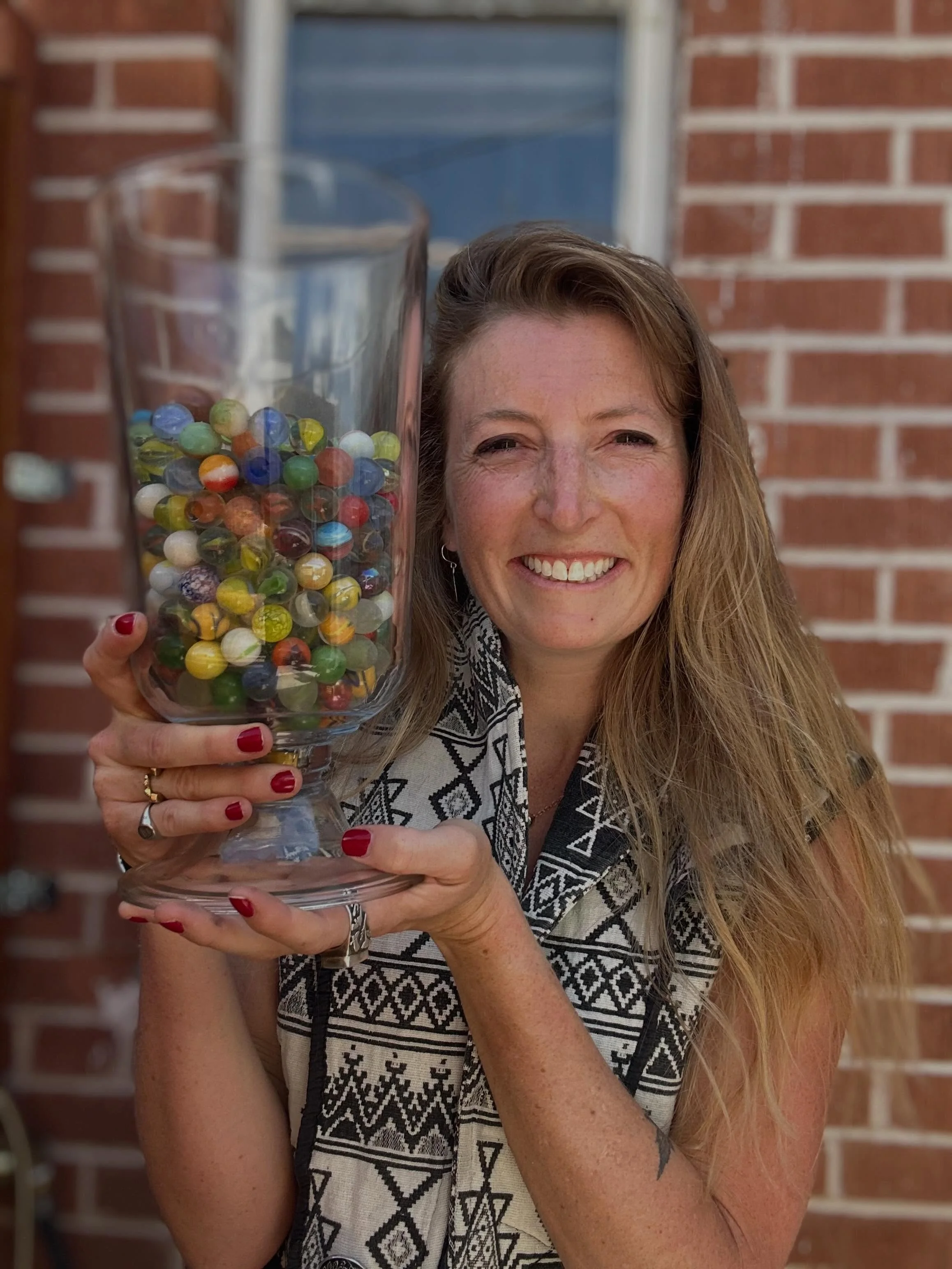 May 2026->Nov 2023 (by @torey_photo). The marbles show just one tiny slice of midwifery work, a marble for each birth I&rsquo;ve attended since starting as a desert midwife in December 2022. In August I&rsquo;ll be moving on from my current job to