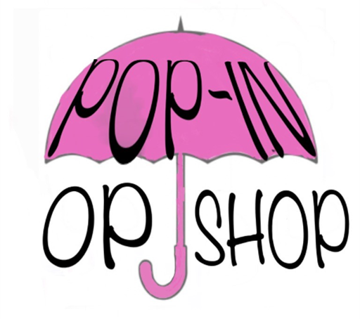 Pink umbrella with black text that reads 'POP-IN' and 'OP SHOP'