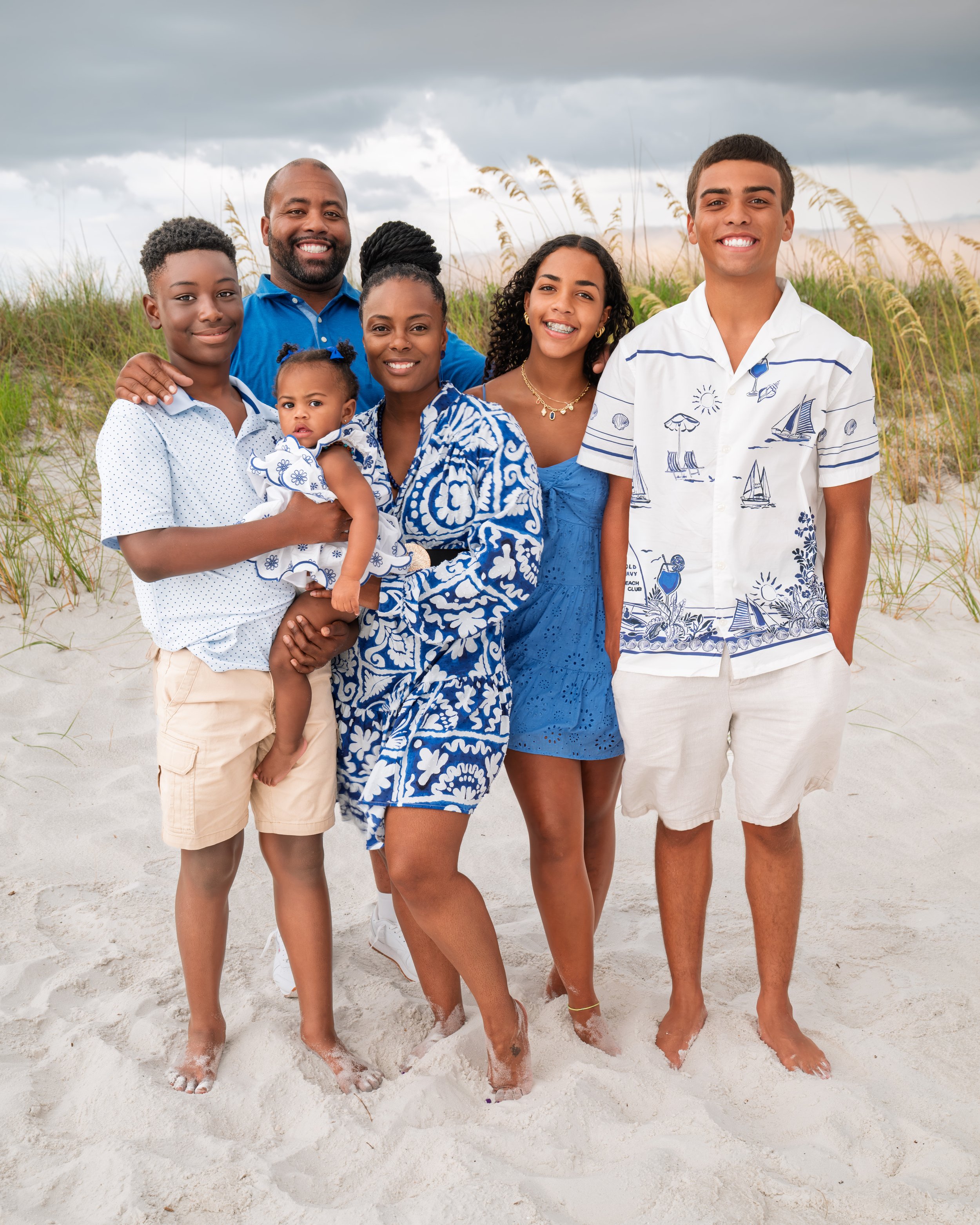 Beautiful family enjoying the beach. 
