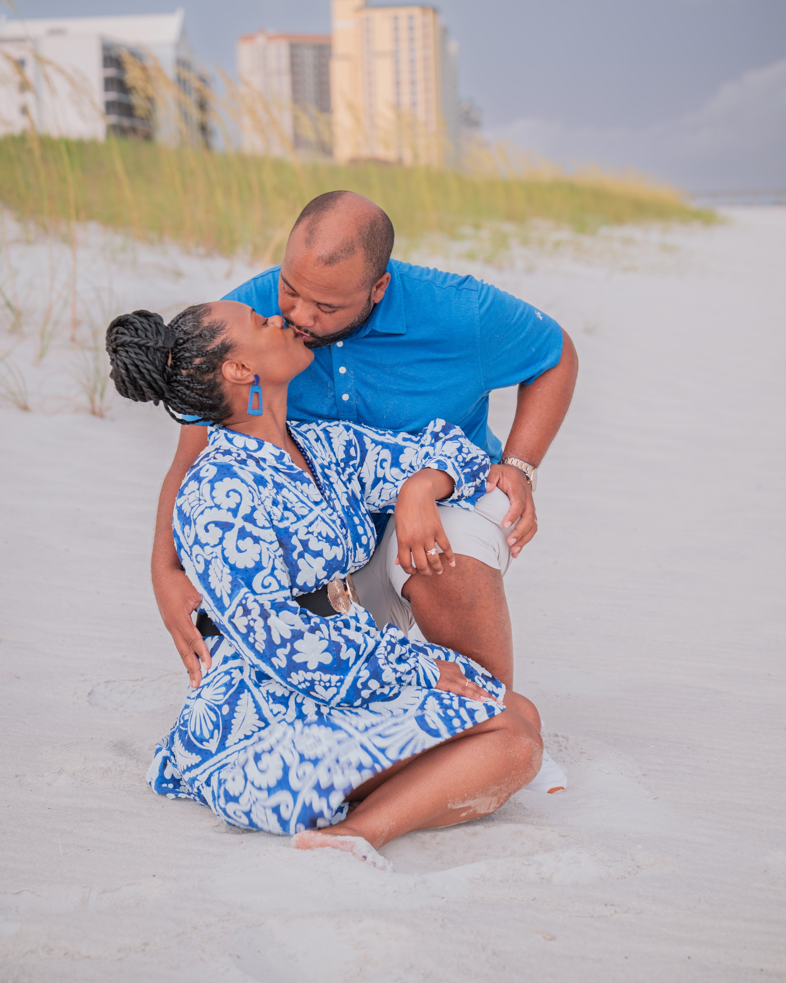 Couple enjoying an intimate moment on the beach. 