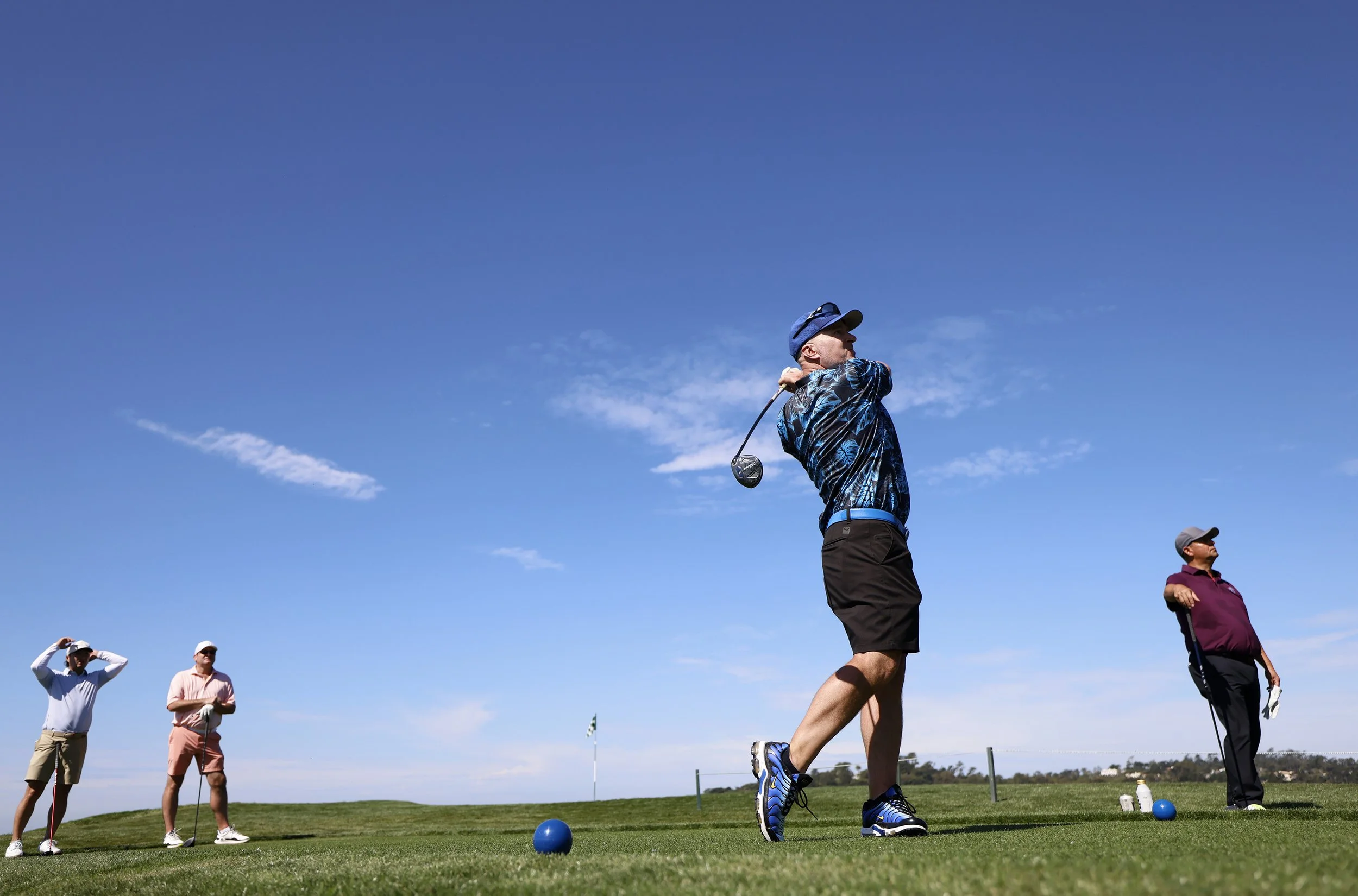 A golfer tees off on the 8th hole at Pebble Beach Golf Links