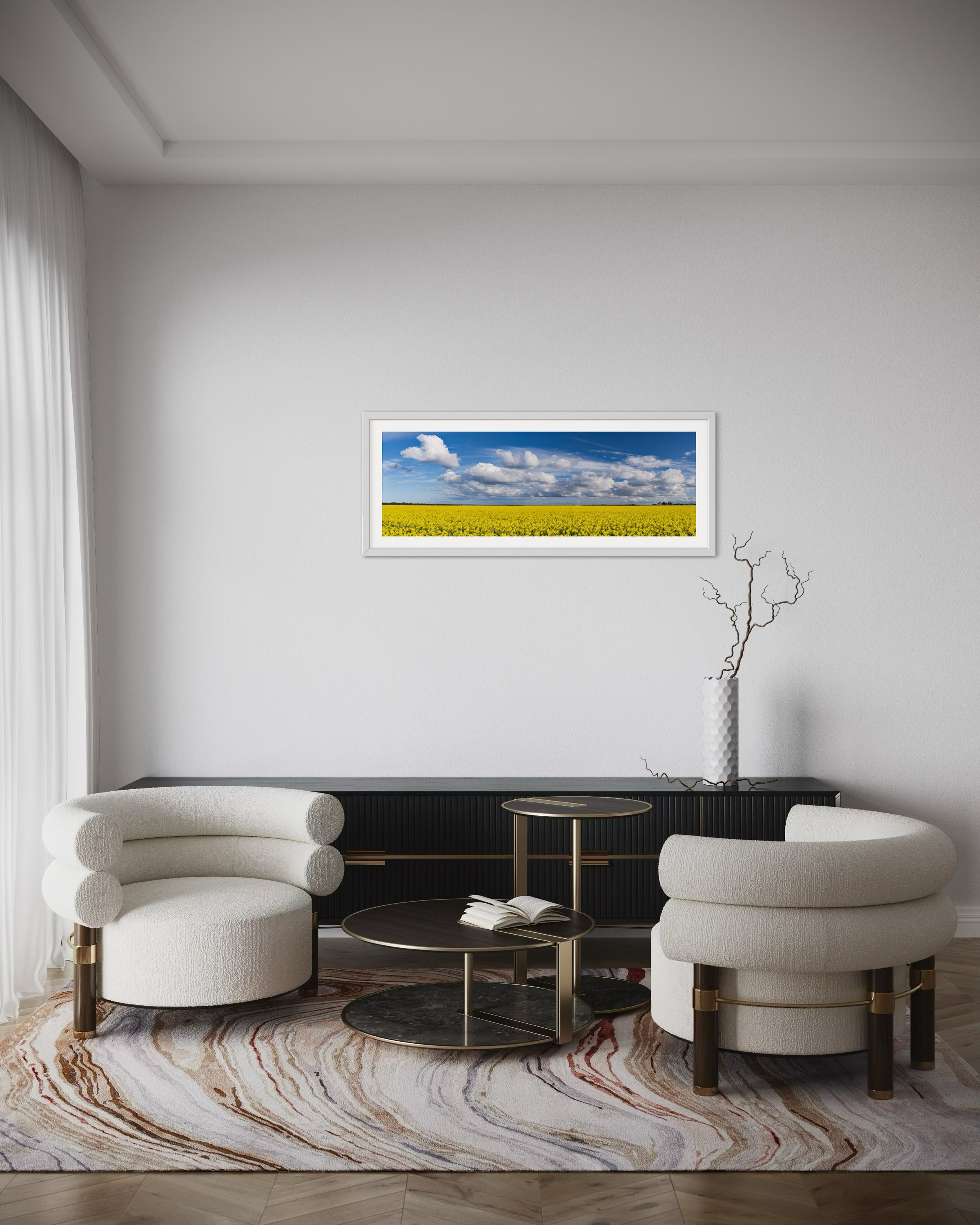 A large panoramic print in a frame in a lounge room for scale.