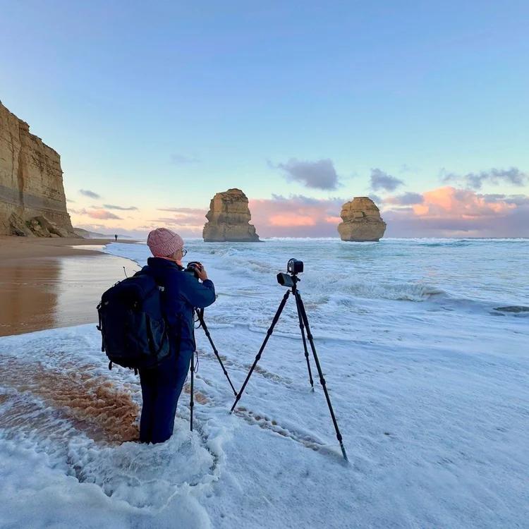 Diane photographing the Twelve Apostles at sunrise