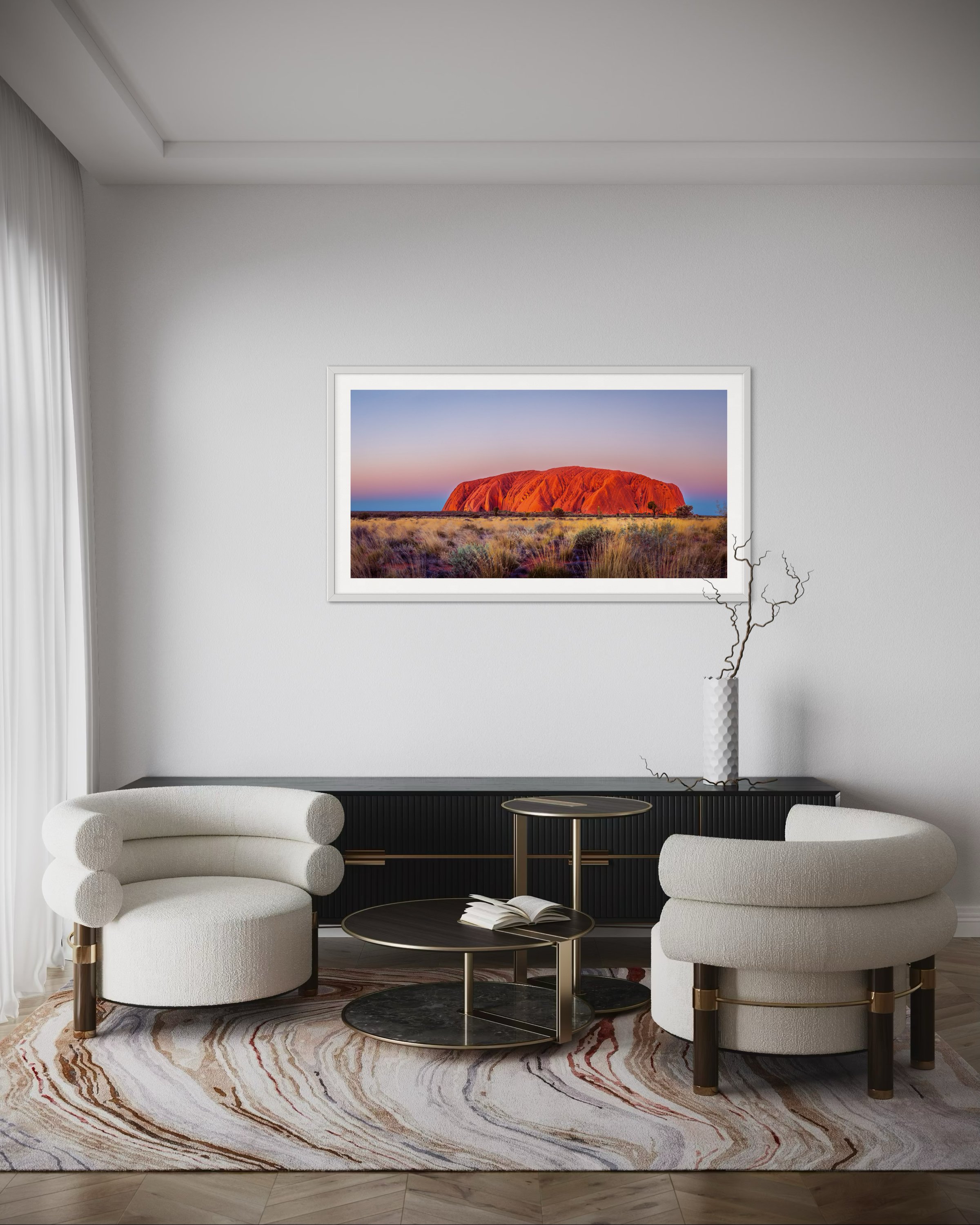 An extra large panoramic print in a frame in a lounge room for scale.