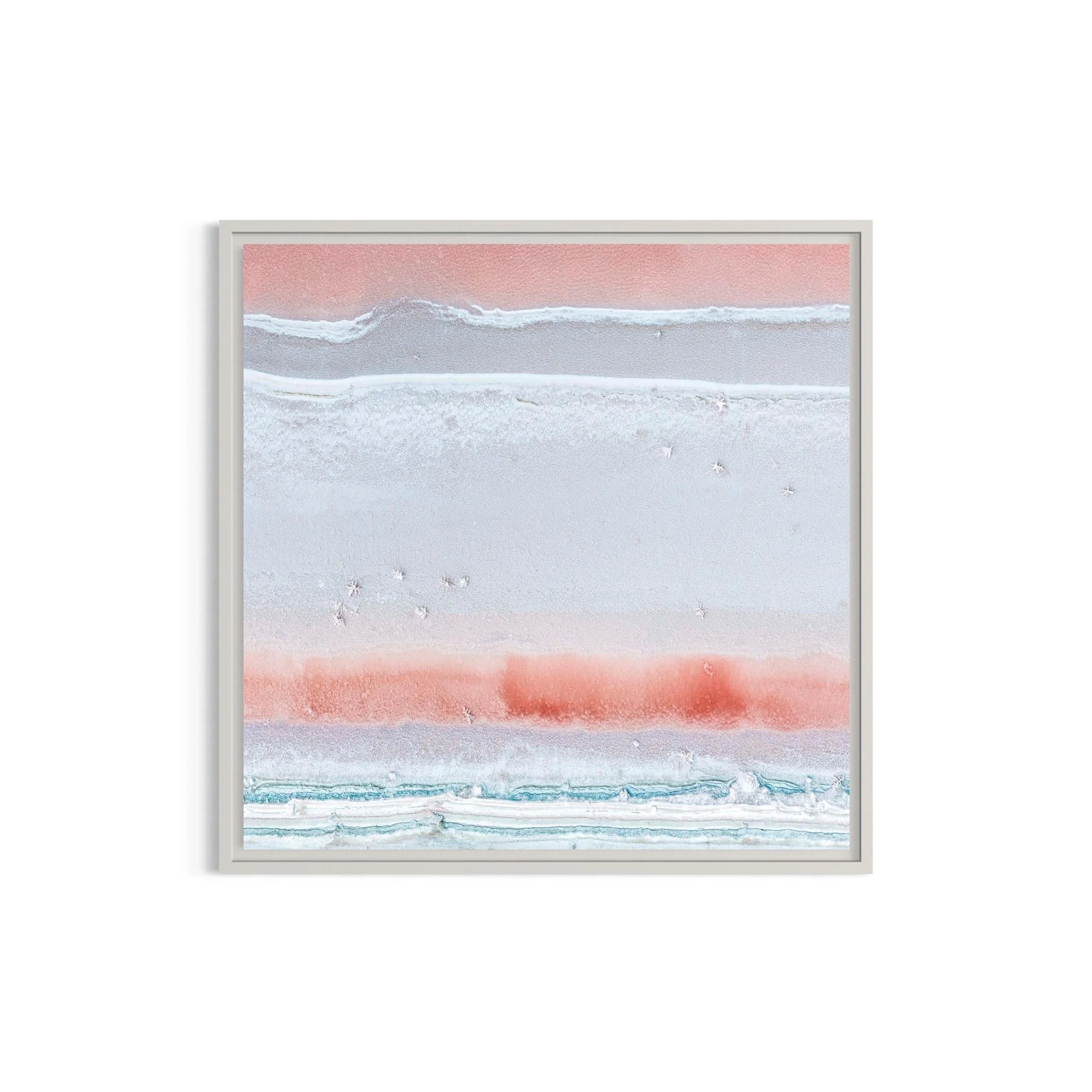 Aerial fine art photograph of the Port Alma salt ponds in Central Queensland, featuring delicate salt crystals forming abstract patterns in soft blush pink, white and turquoise mineral pools.