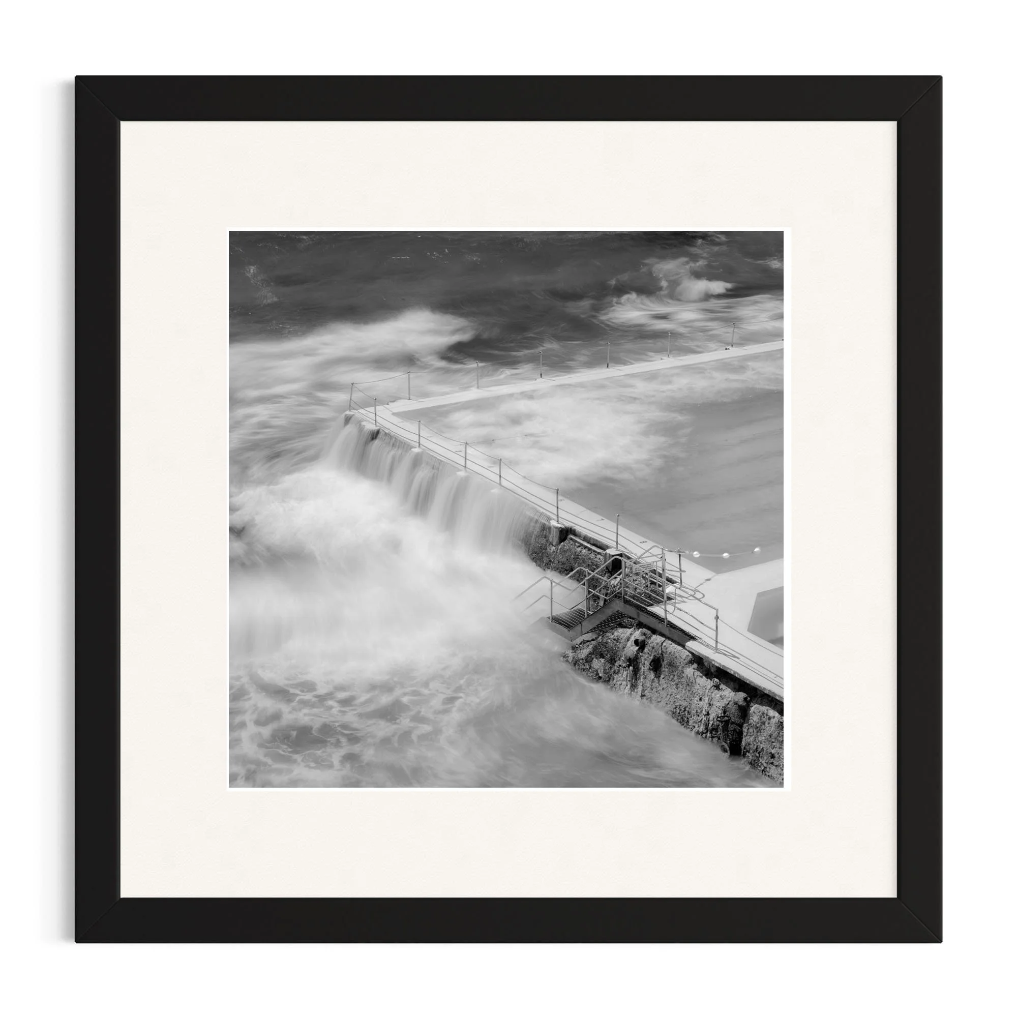 Still, We Breathe_A contemplative black and white photograph of Bondi’s ocean pool, capturing resilience, flow, and quiet strength through long exposure seascape photography.