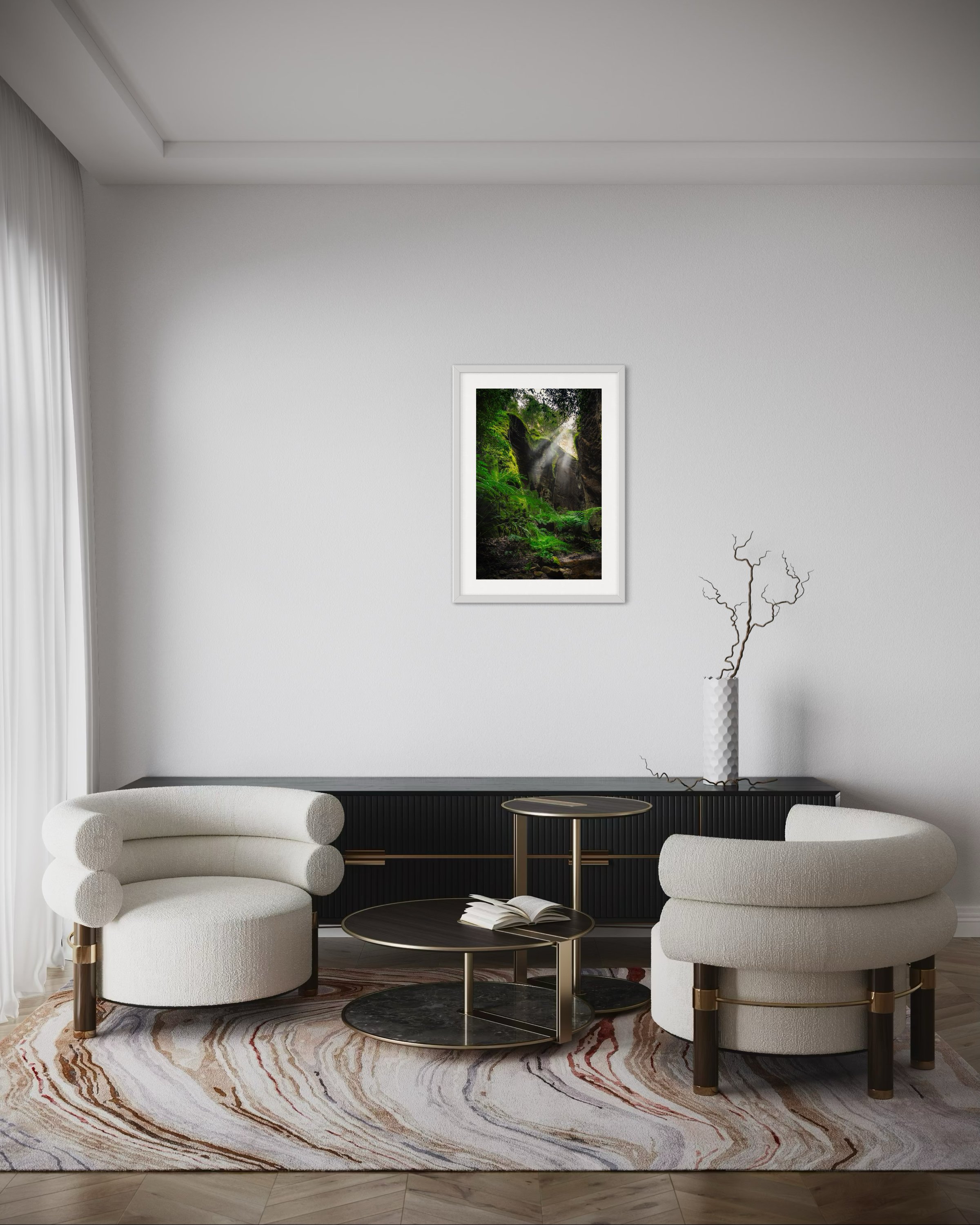 A large portrait print in a frame in a lounge room for scale.