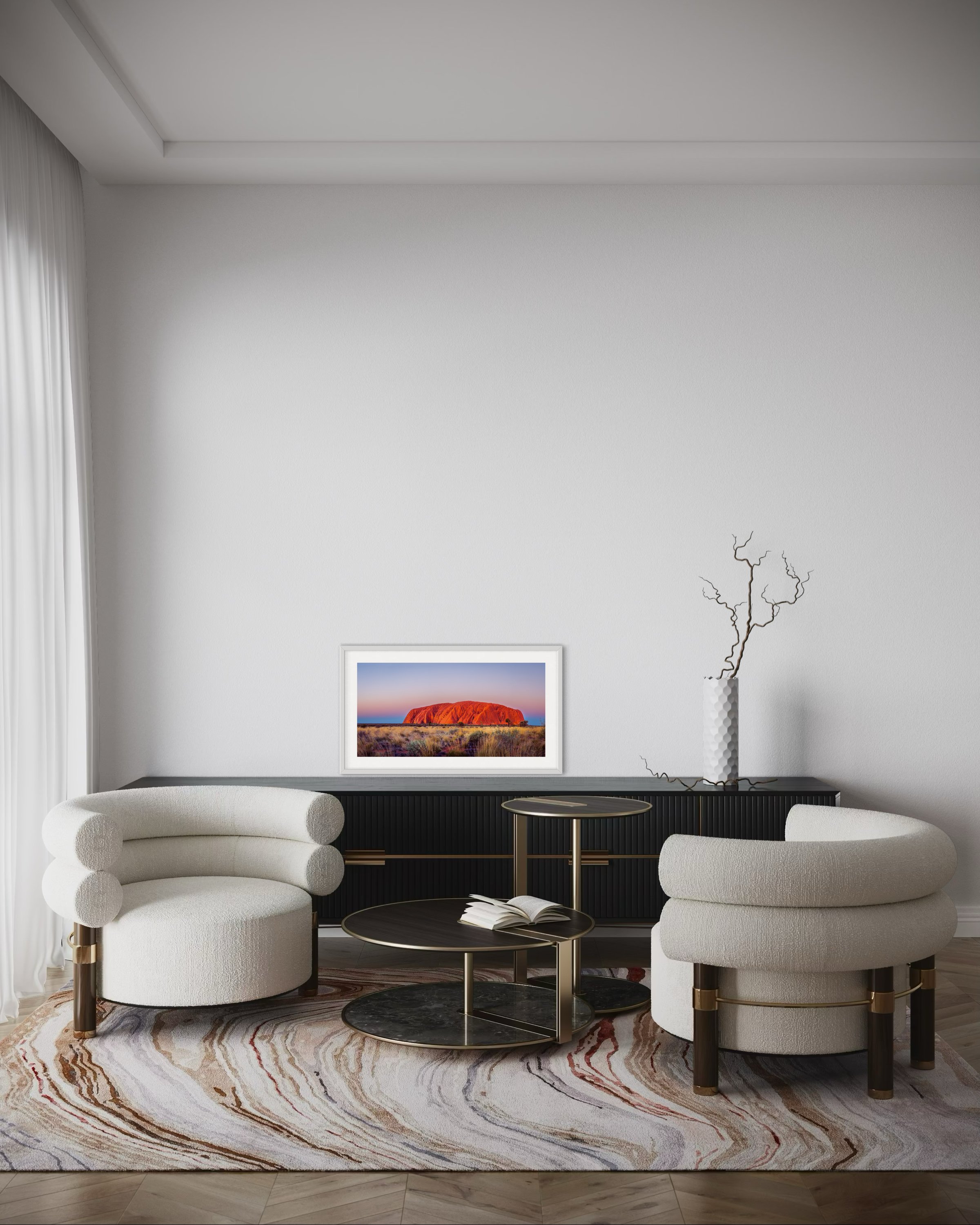 A small panoramic print in a frame in a lounge room for scale.