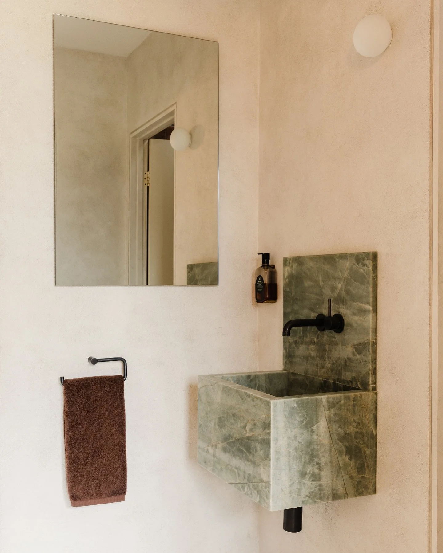 A nice little capture of our Ridge Project Powder Room.
You can&rsquo;t see the limestone floor but it adds another warm hue. Love this combination 🤍
. 
Esmerelda quartzite @artestone_group 
Antique Brass Tapware @faucetstrommen 
French Wash walls @